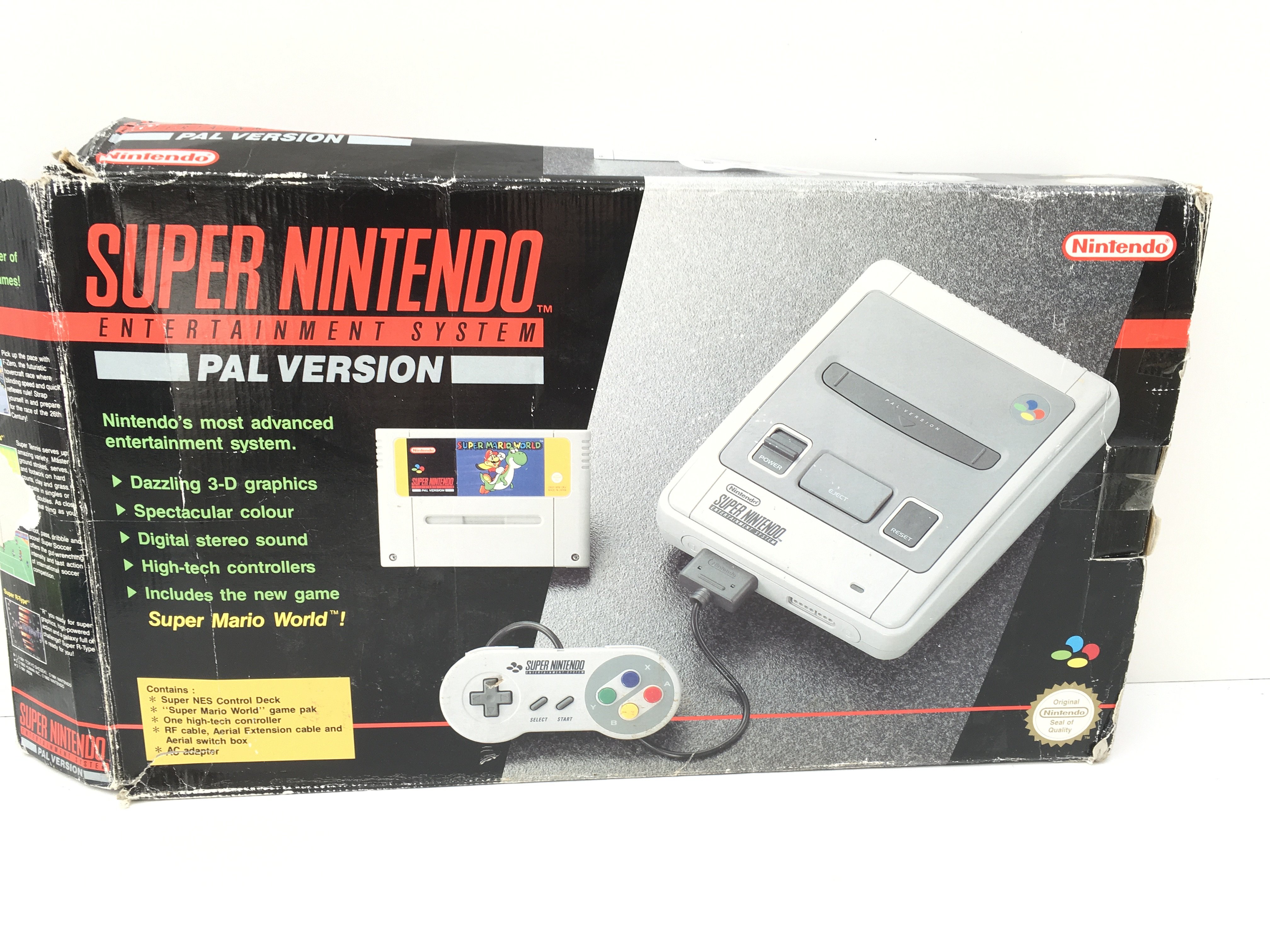 A boxed Super Nintendo Entertainment System. PAL Version. Includes controllers..power supply..cables. No reserve
