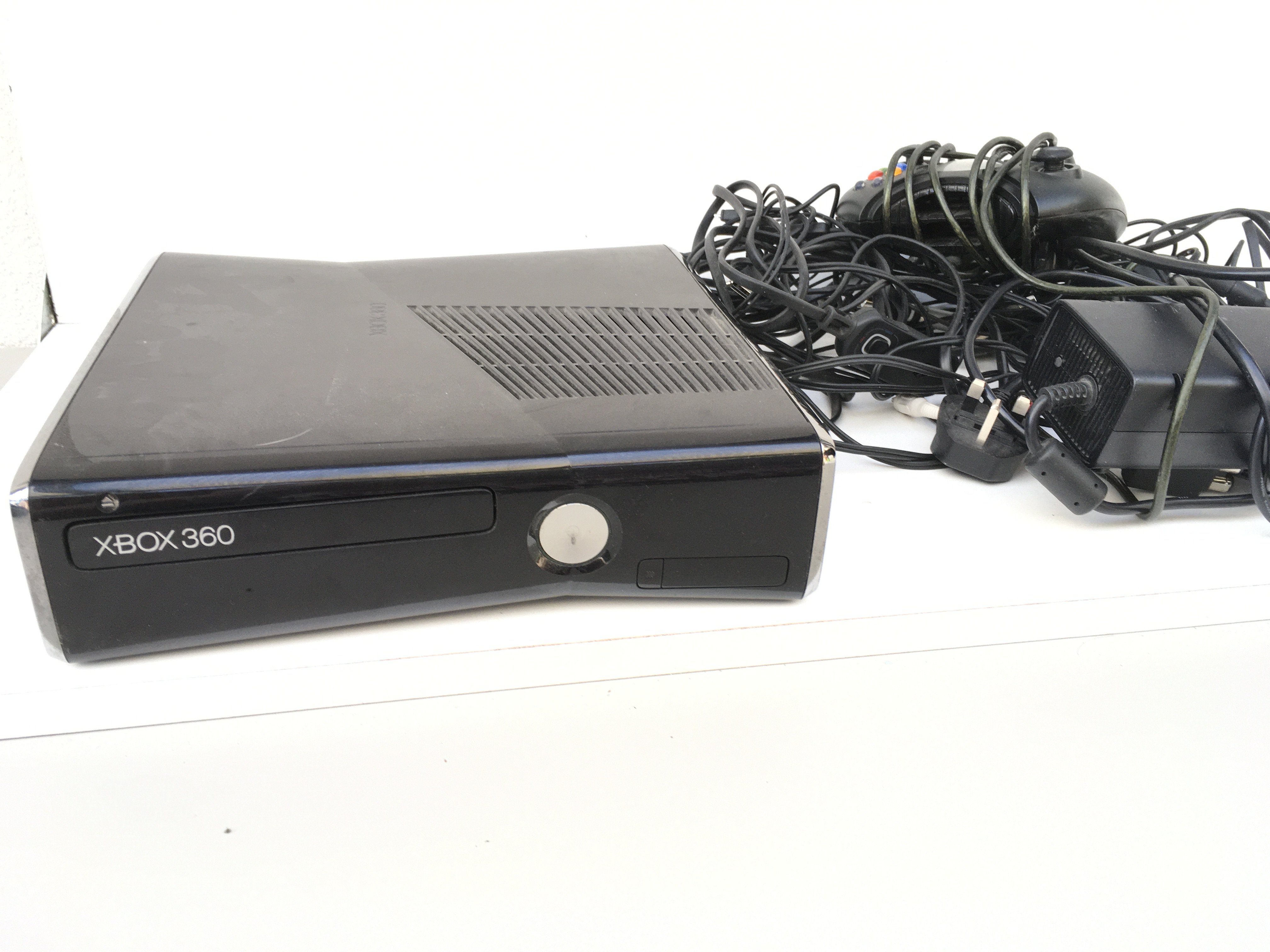 An XBOX 360 with controller..power supply and cables. No reserve