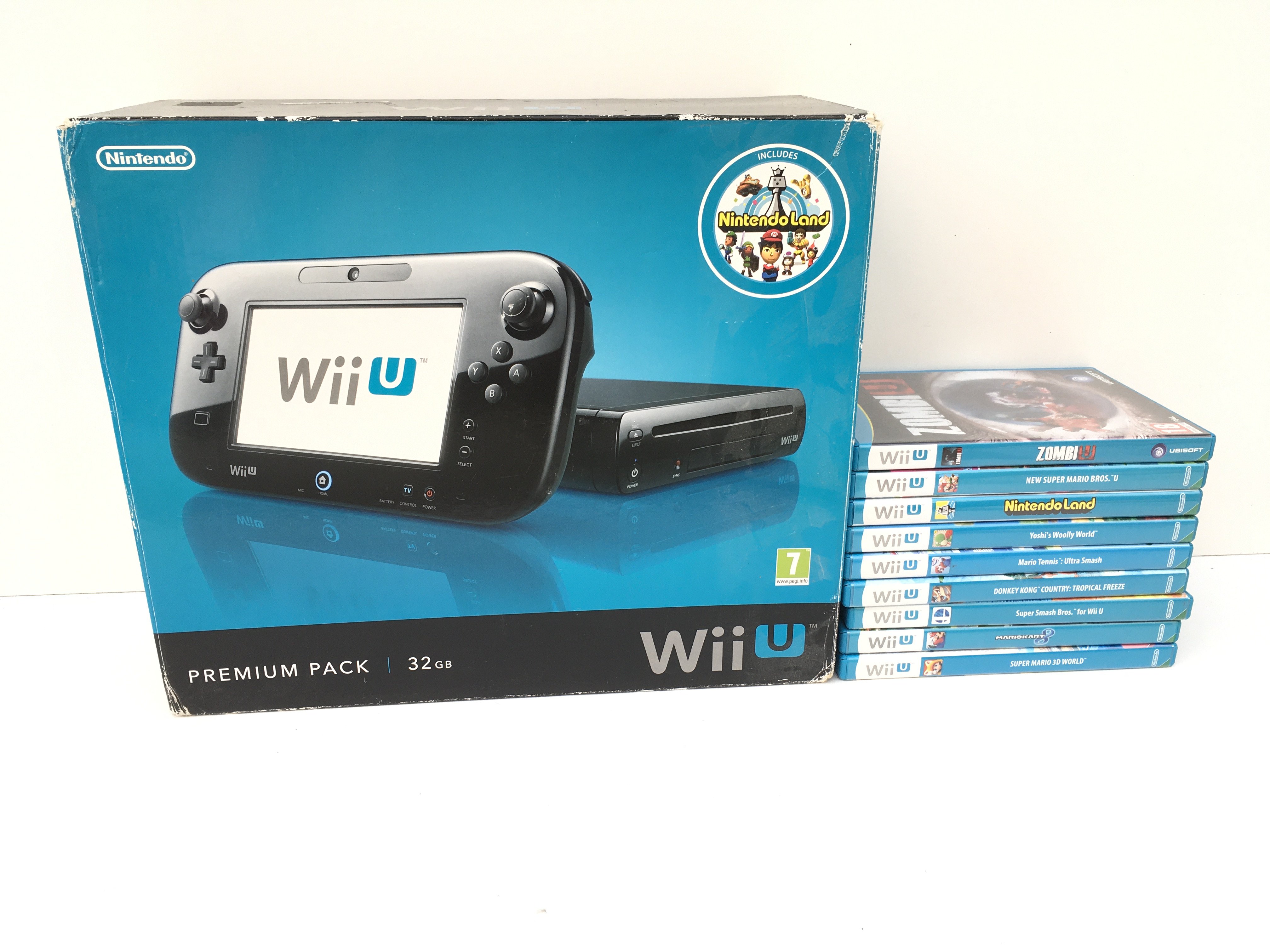 A boxed Nintendo Wii Premium pack. 32GB. Includes power supply..cables..manual and 9x boxed games discs. No reserve