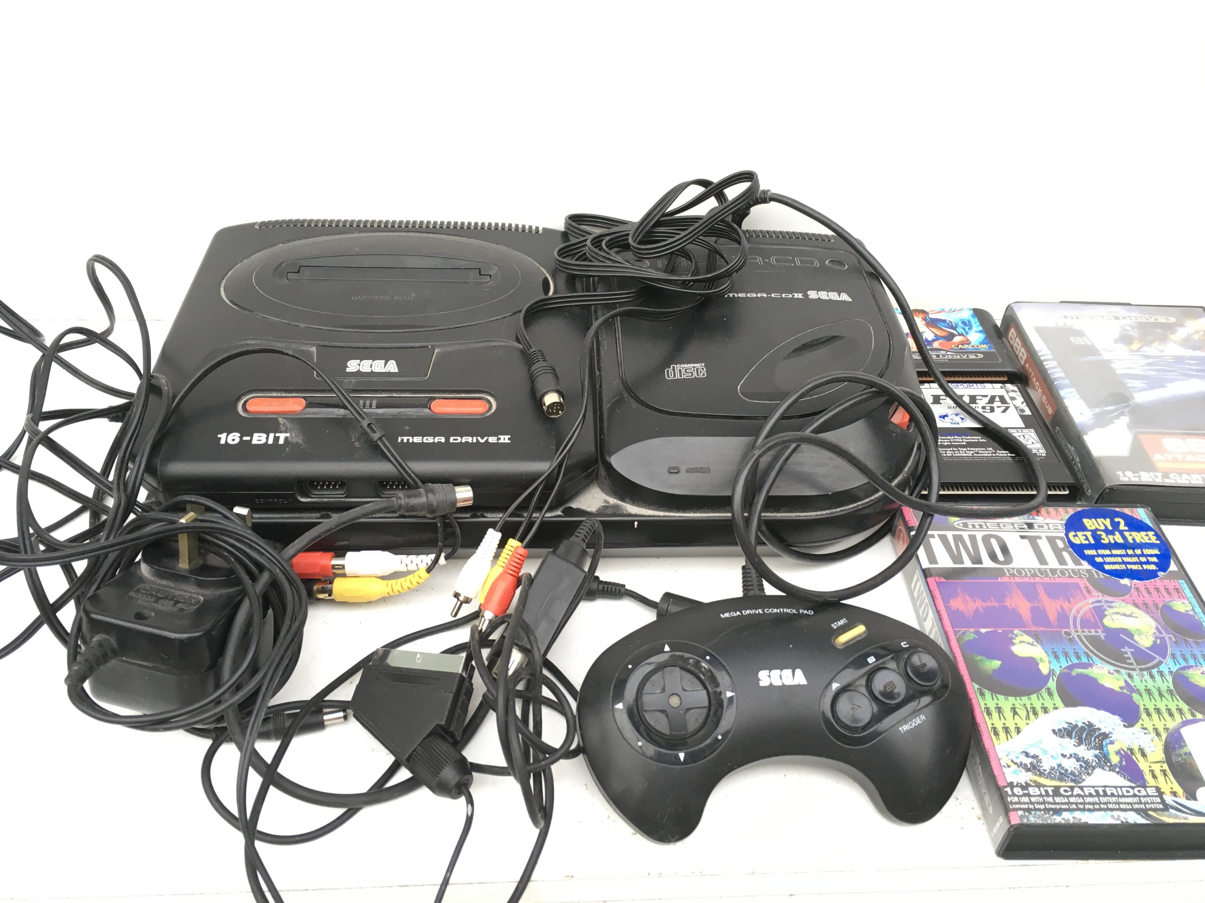 A Sega Mega Drive II . Includes controller..power supply..cables..game cartridges. No reserve