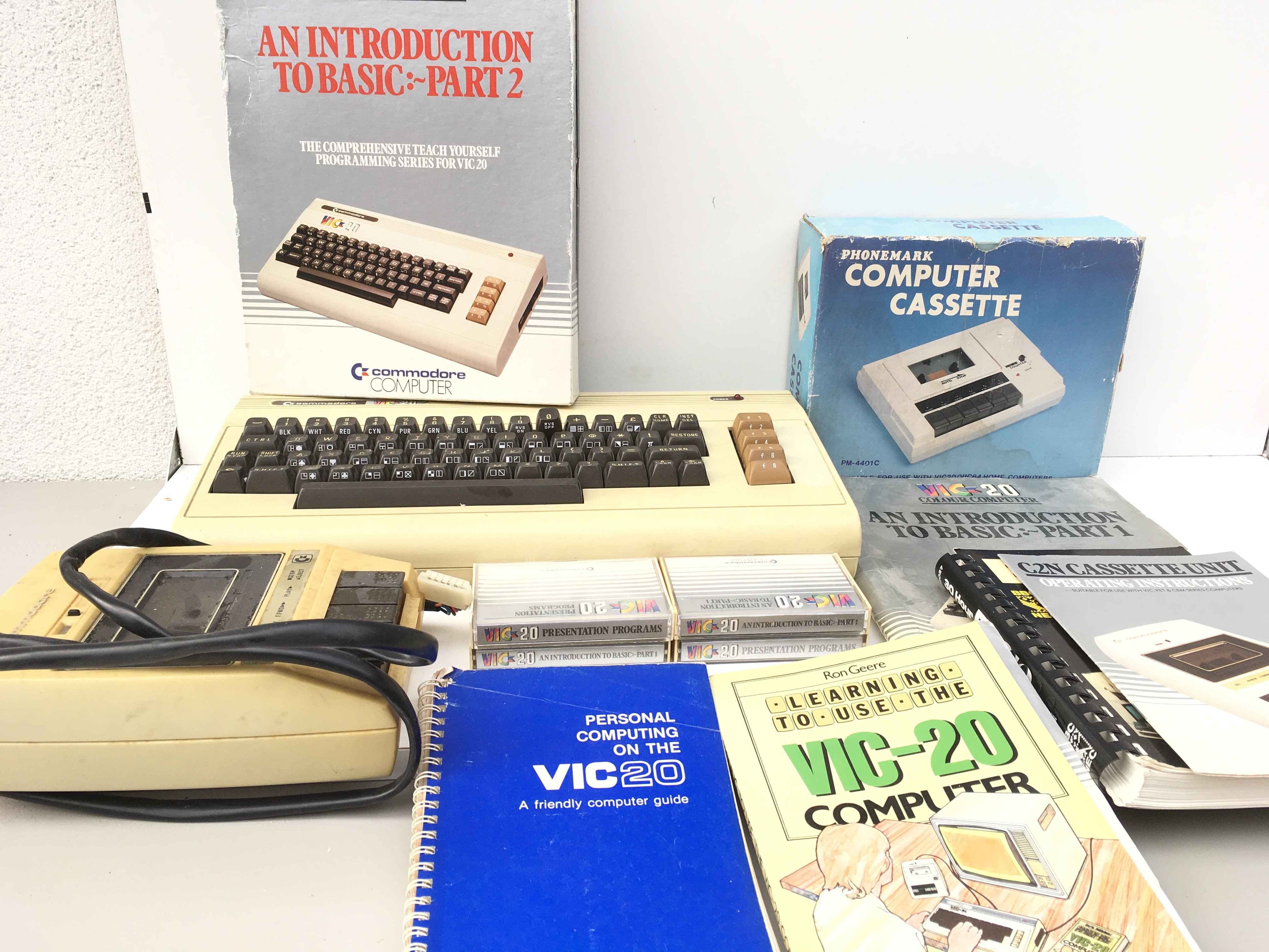 A Commodore VIC-20 computer includes cassette players, cassettes and manuals. No reserve.