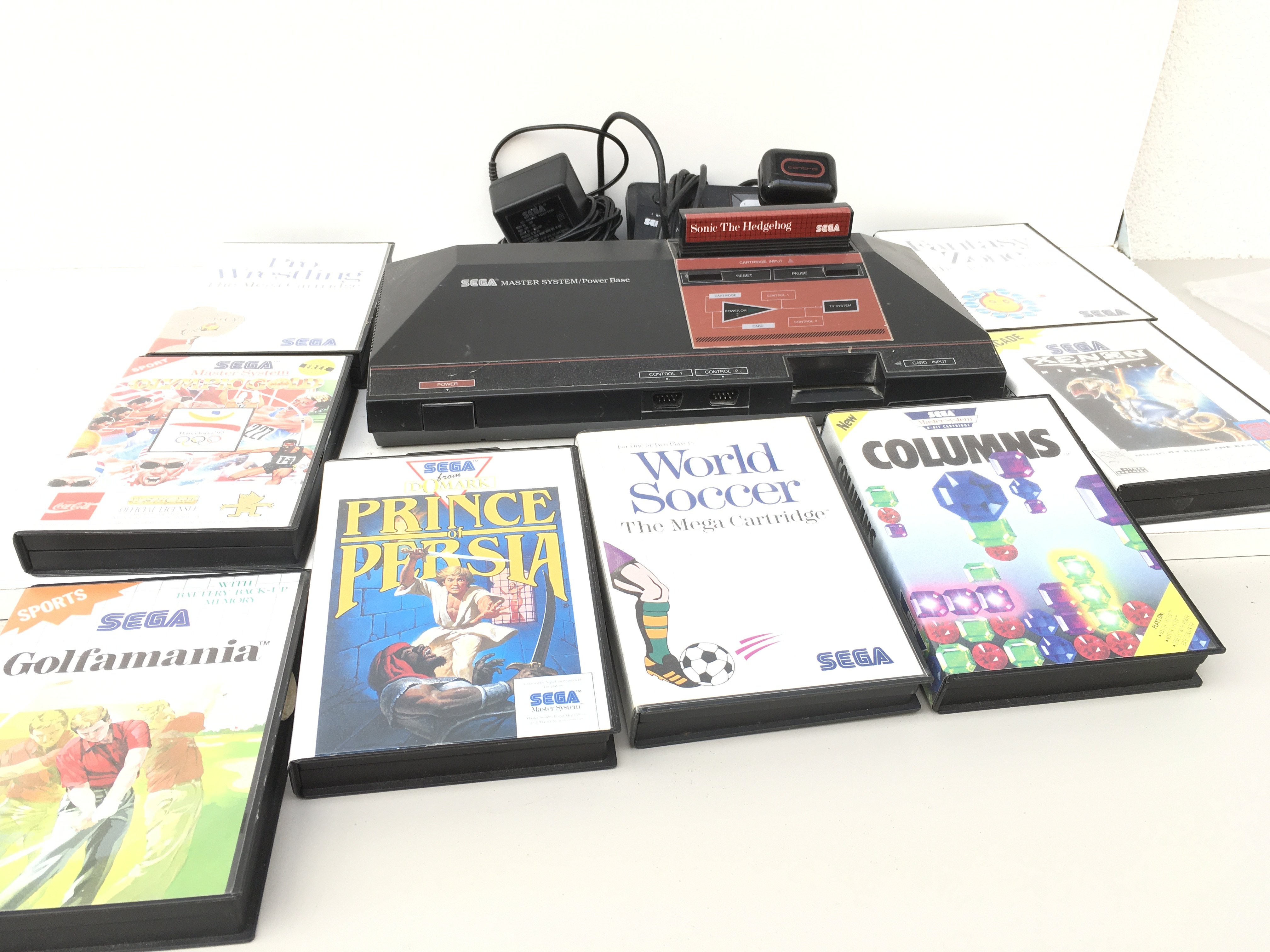 A SEGA Master System includes power supply..control stick..9 games cartridges. No reserve