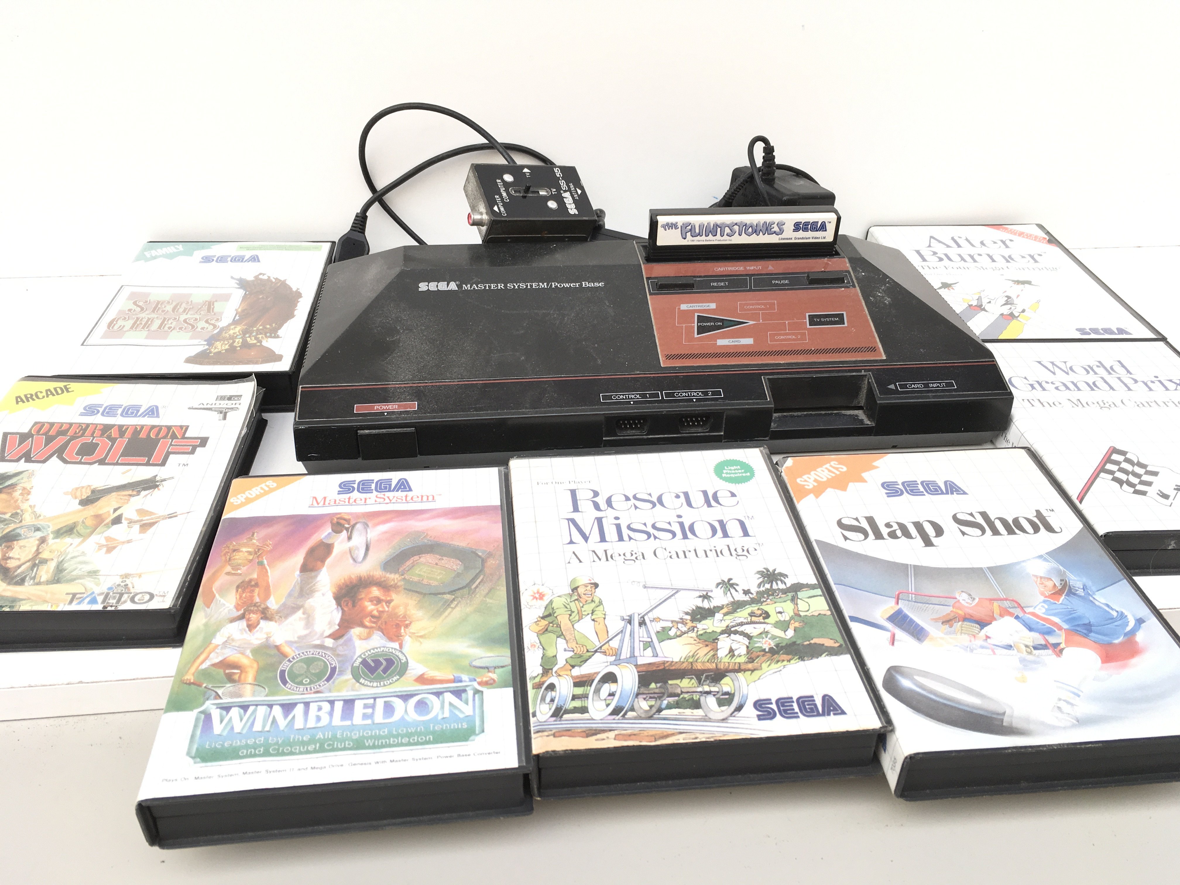 A SEGA Master System including power supply..controller and 8 games cartridges. No reserve