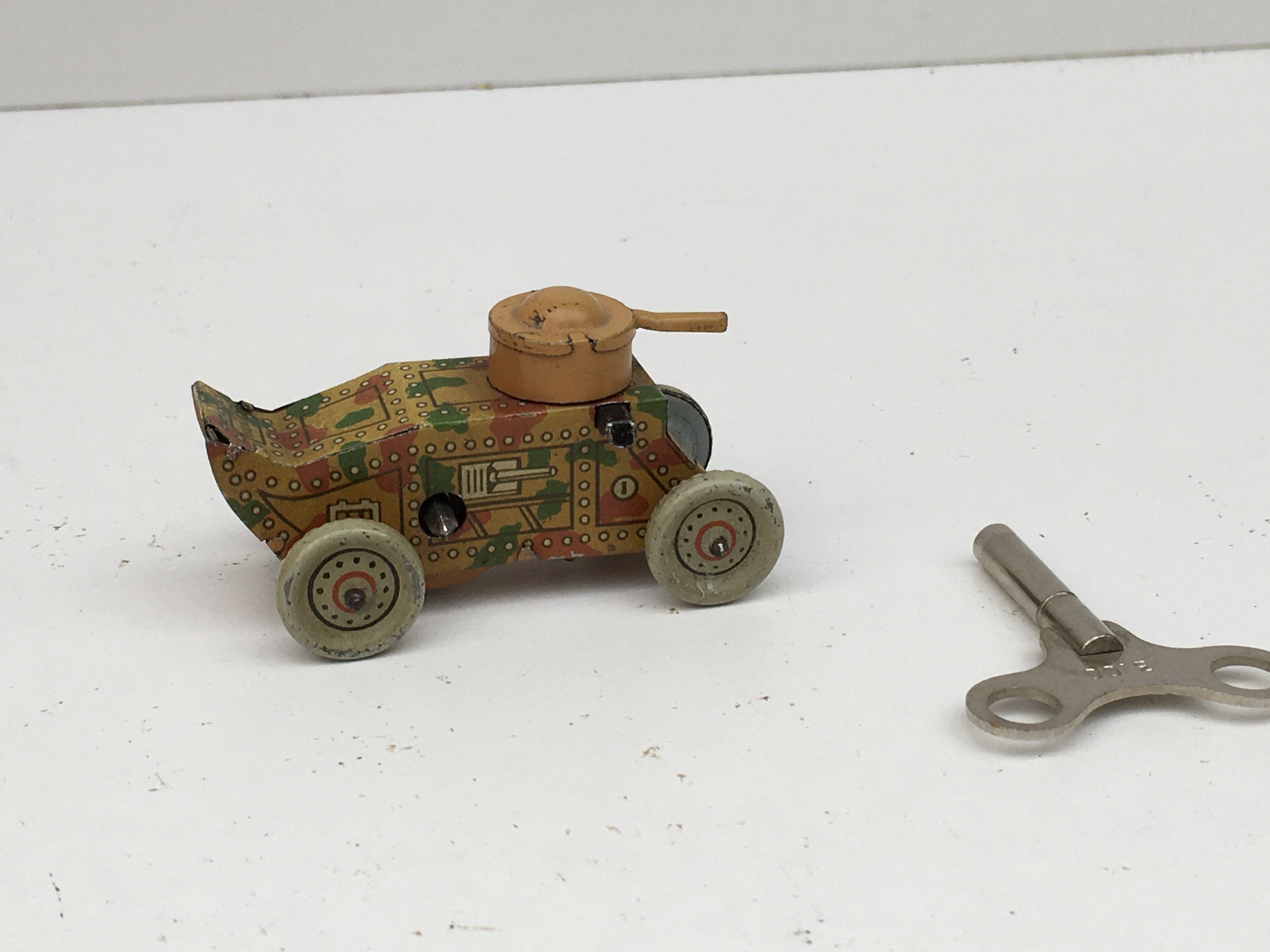 Pre-war tinplate penny toy.. clockwork with key. Model is armoured Car.