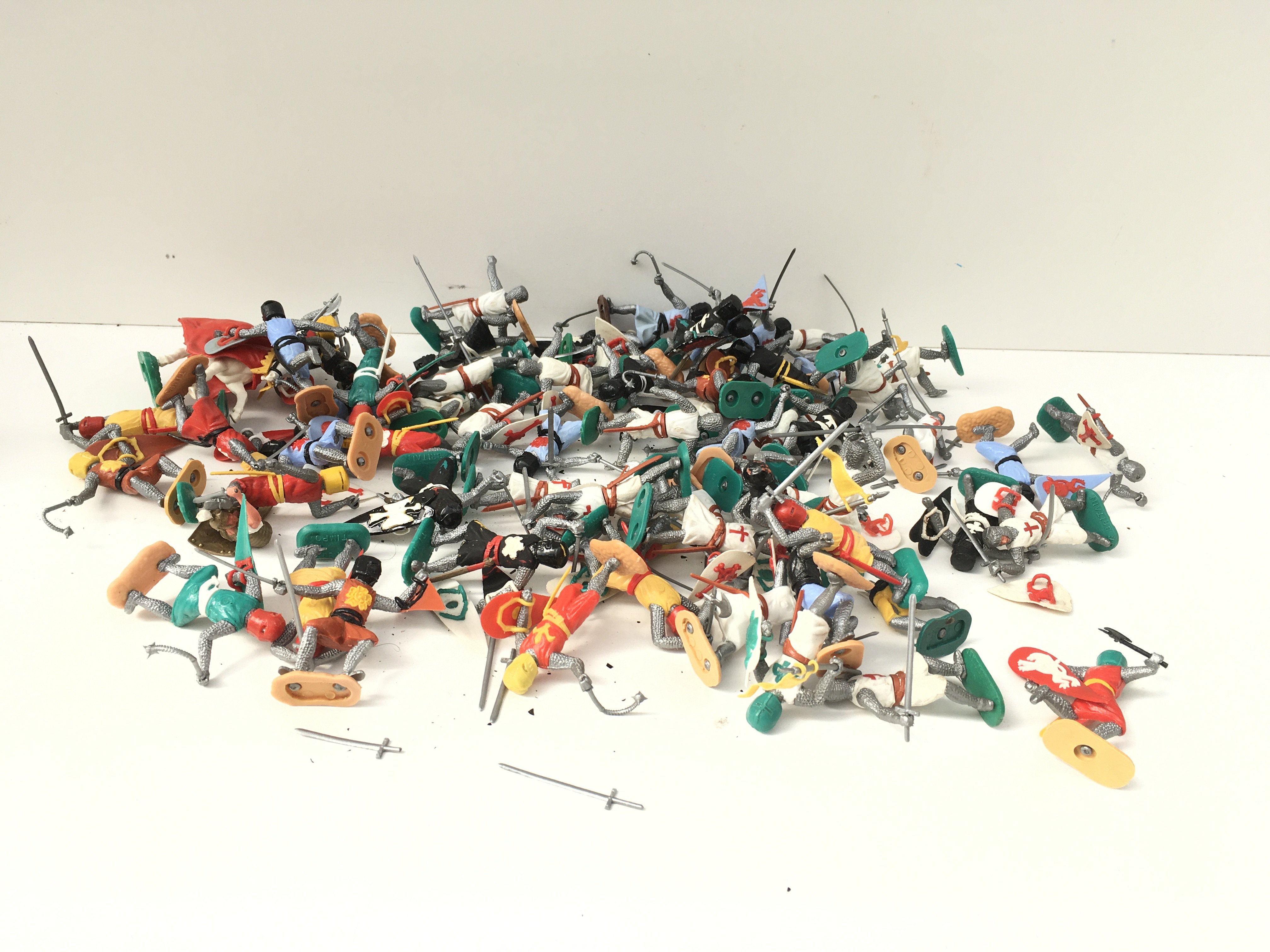 A collection of Timpo plastic knights including crusaders and others. No reserve