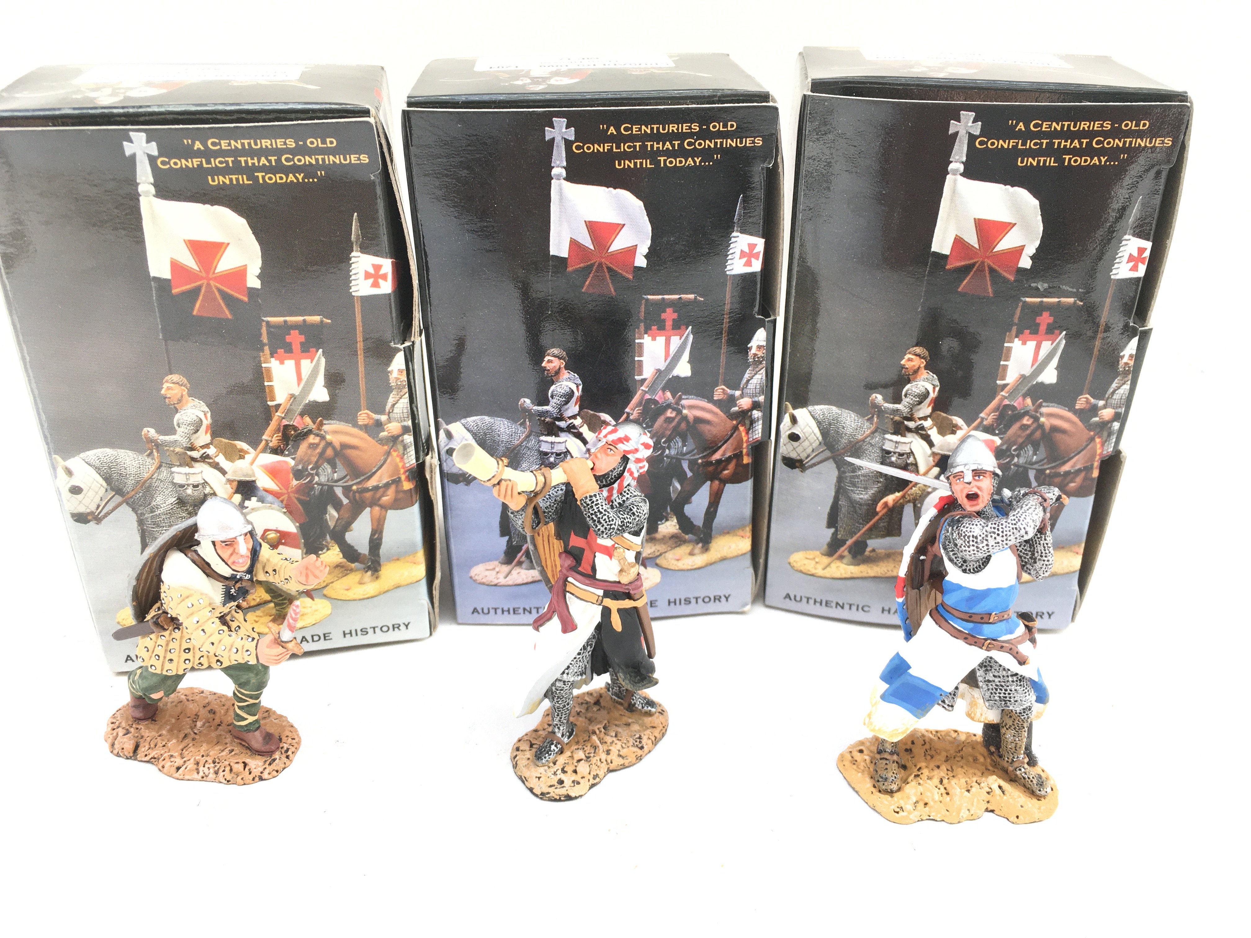 3 X Boxed King And Country Crusader Figures. Man At Arms With Dagger. Horn Blower And Fighting Knight With Sword.