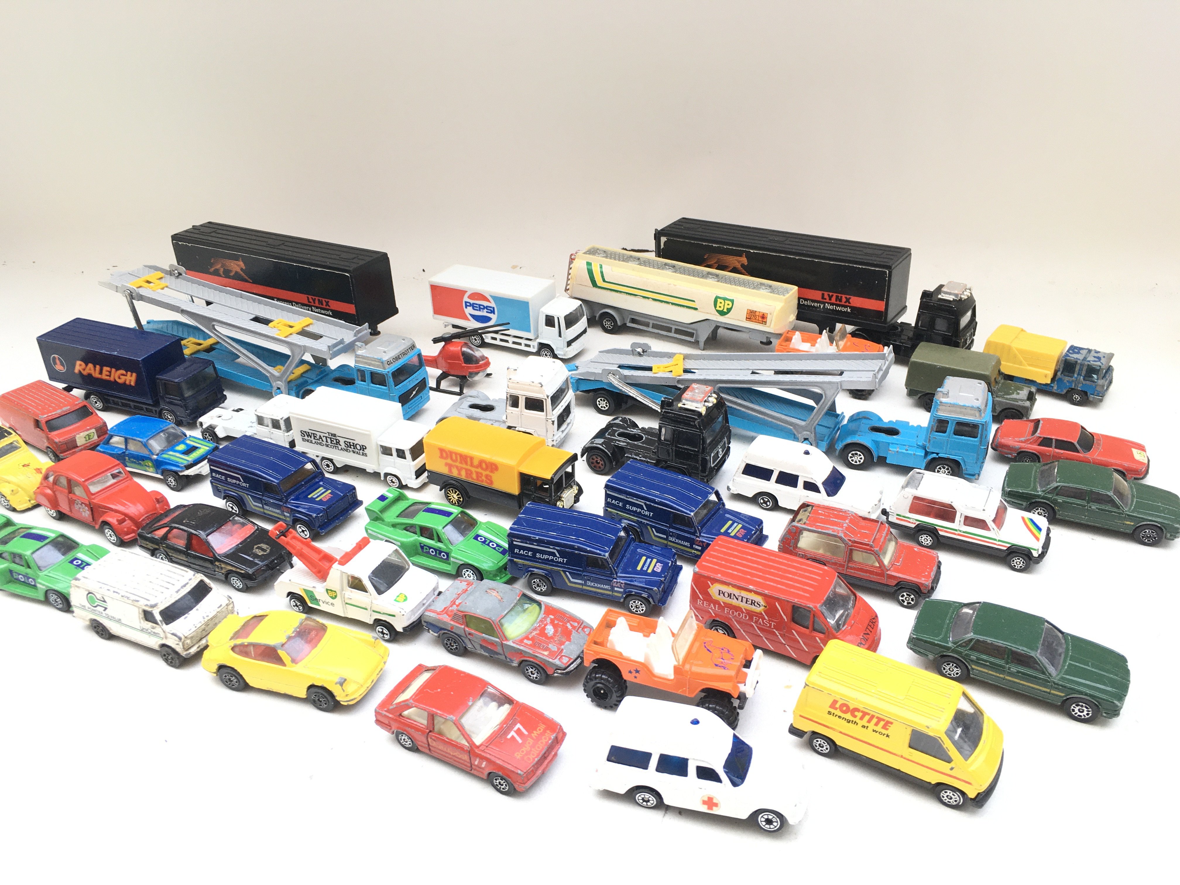 A Box Containing Playworn Corgi Diecast.