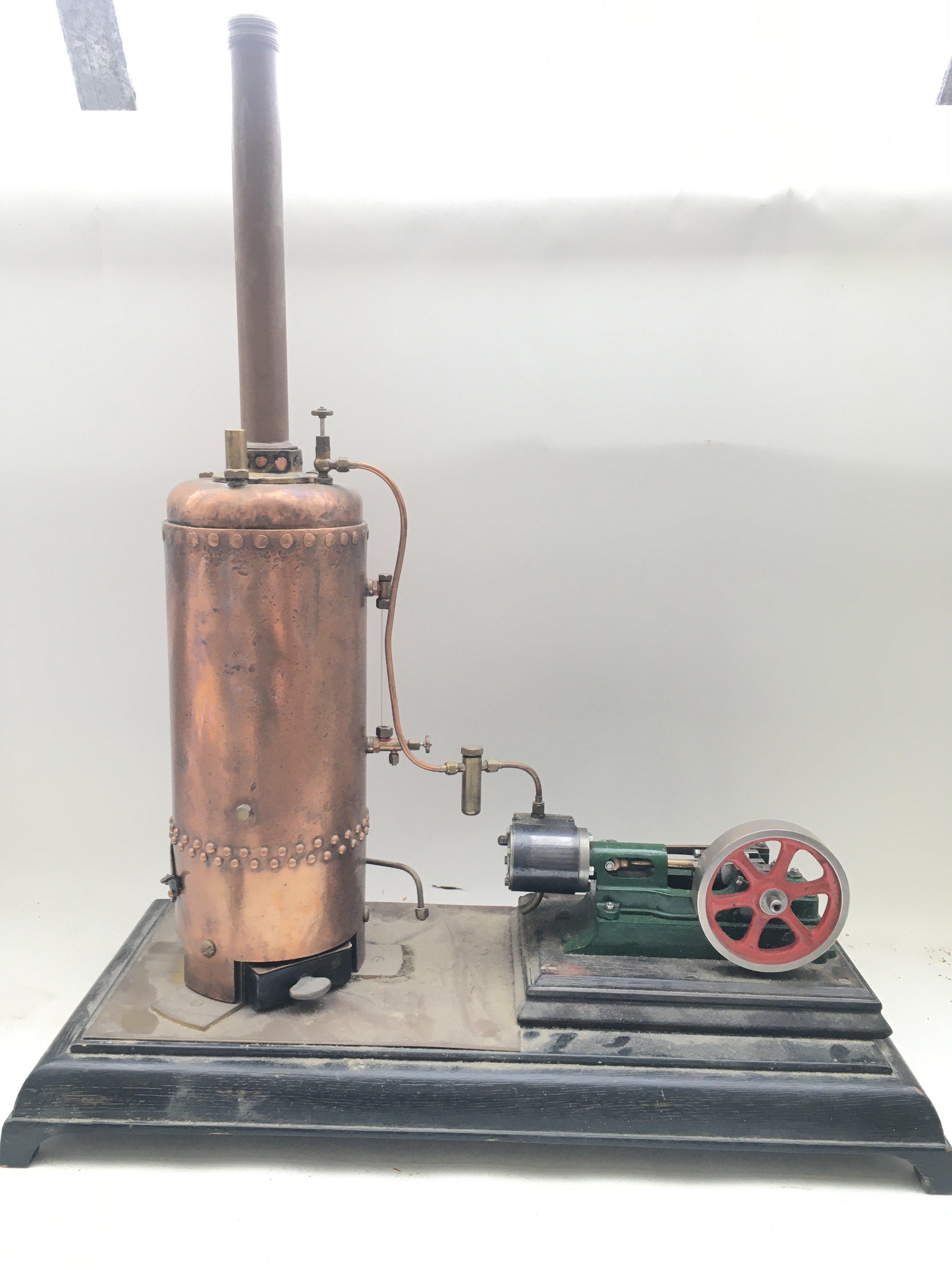 A Model Stuart Steam Boiler On Plinth Base. Approx Height 63CM And Length 53CM.