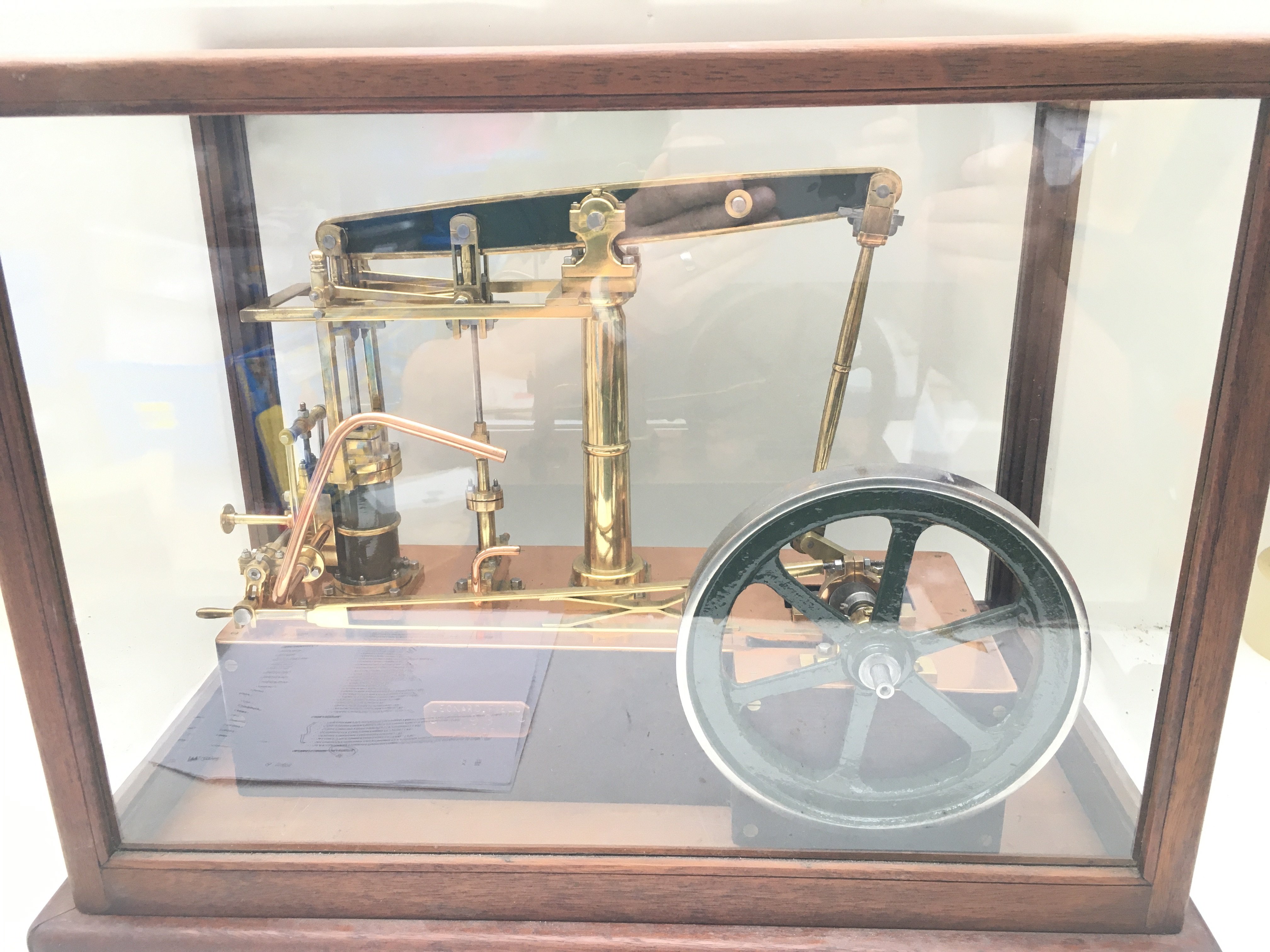 A Leonard 1931 pistol Model Engine in Display Case. Approx Height 38CM. Length 52CM