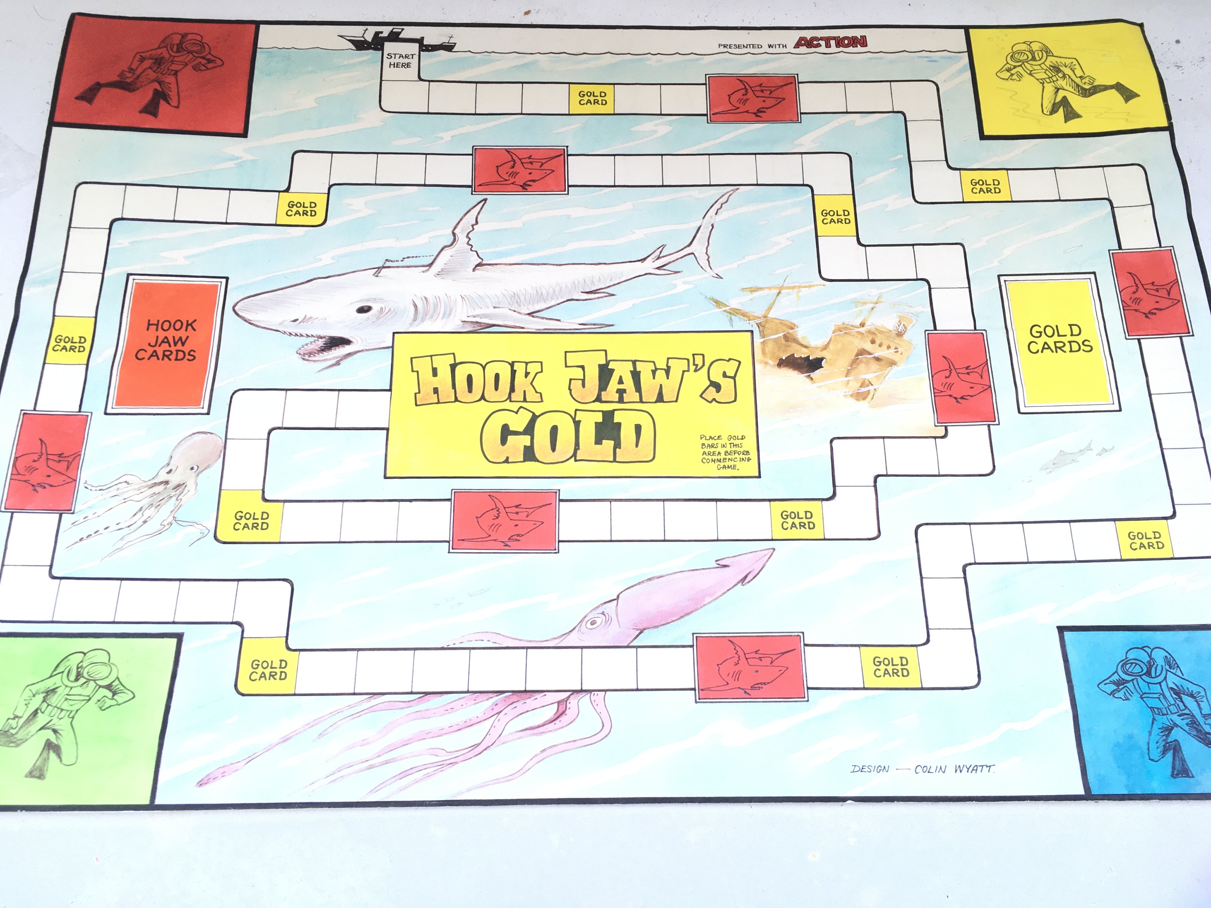 Art Work By Colin Wyatt For The Action Comic 25th June 1977. This Is The Artwork For The Pull Out Of Hook Jaws Gold Game. This Also Includes The Original Front Cover Proof. And the Original Sketch Drawing. These had To Be Collected Over 4 Issues.