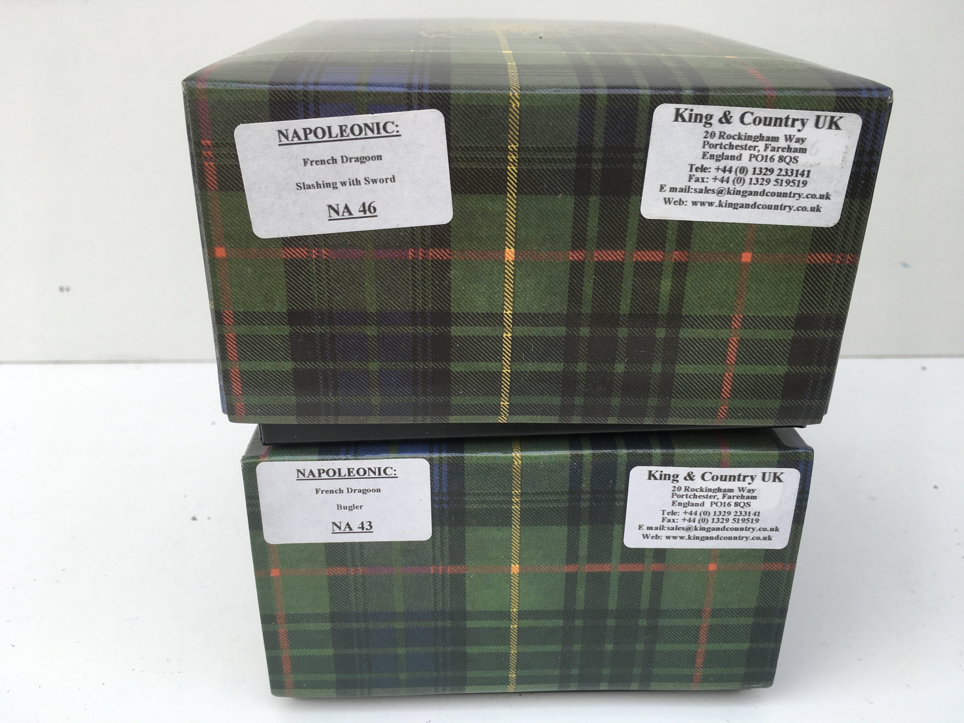 2x boxed King and Country Napoleonic Minature military models featuring NA46 French Dragoon slashing with sword and NA43 French Dragoon Bugler. No reserve.