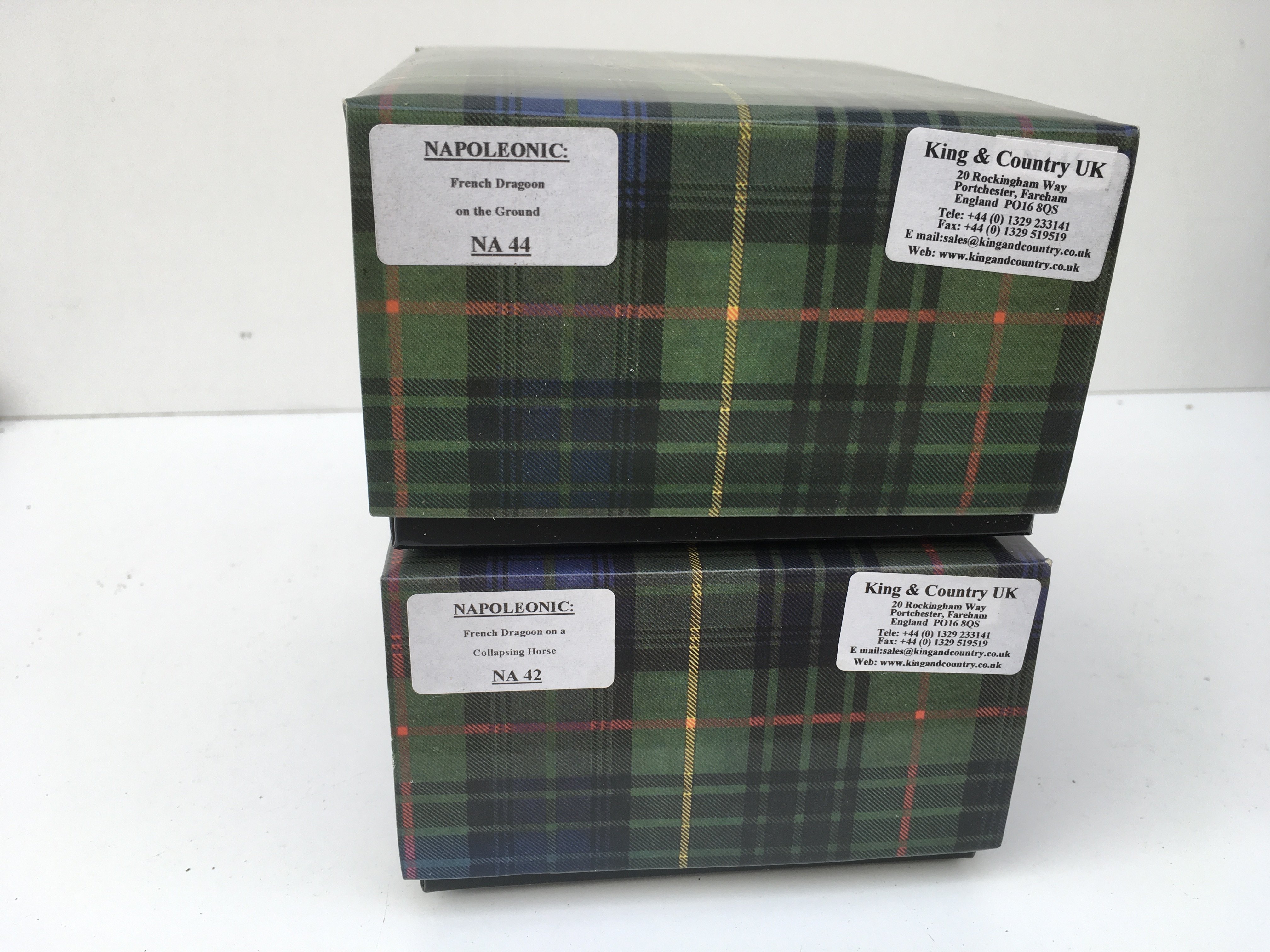 2x boxed King and Country Napoleonic Minature Military Models featuring NA44 French Dragoon on the floor and NA42 French Dragoon on a collapsing horse. No reserve