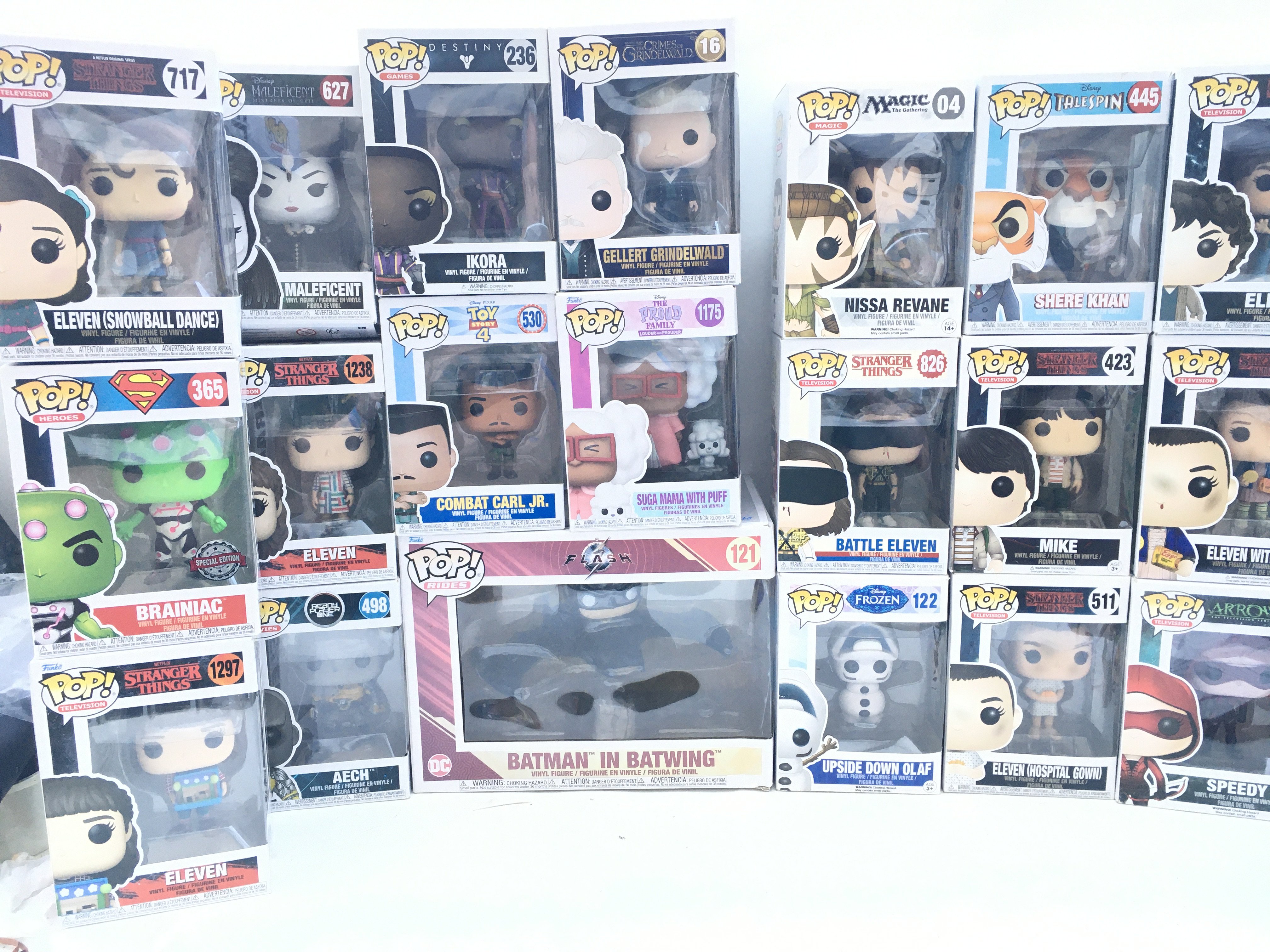 A Collection of Boxed Funko Pop Figures.