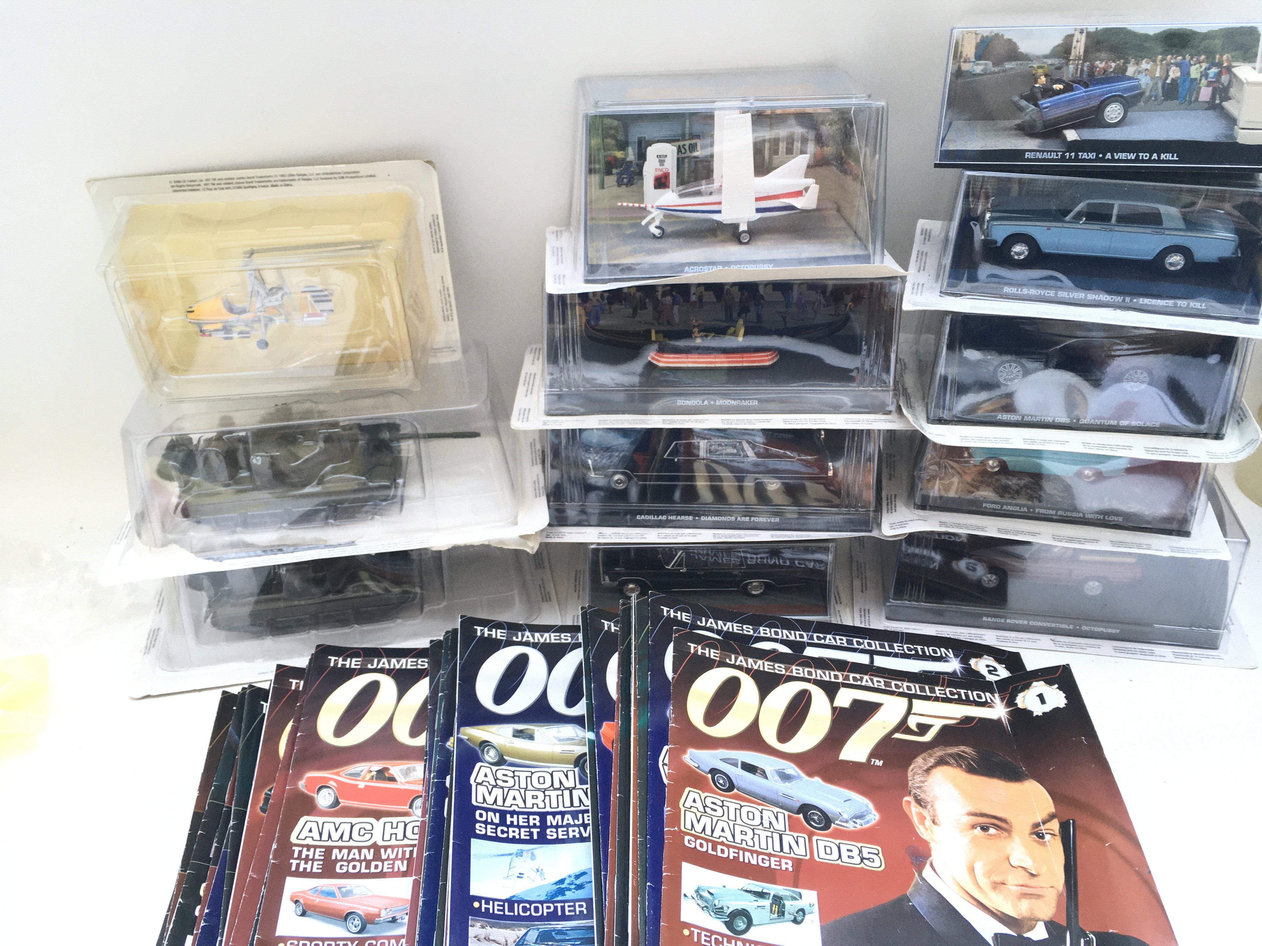 6 Boxes Containing the Complete James Bond Car Collection. (6).
