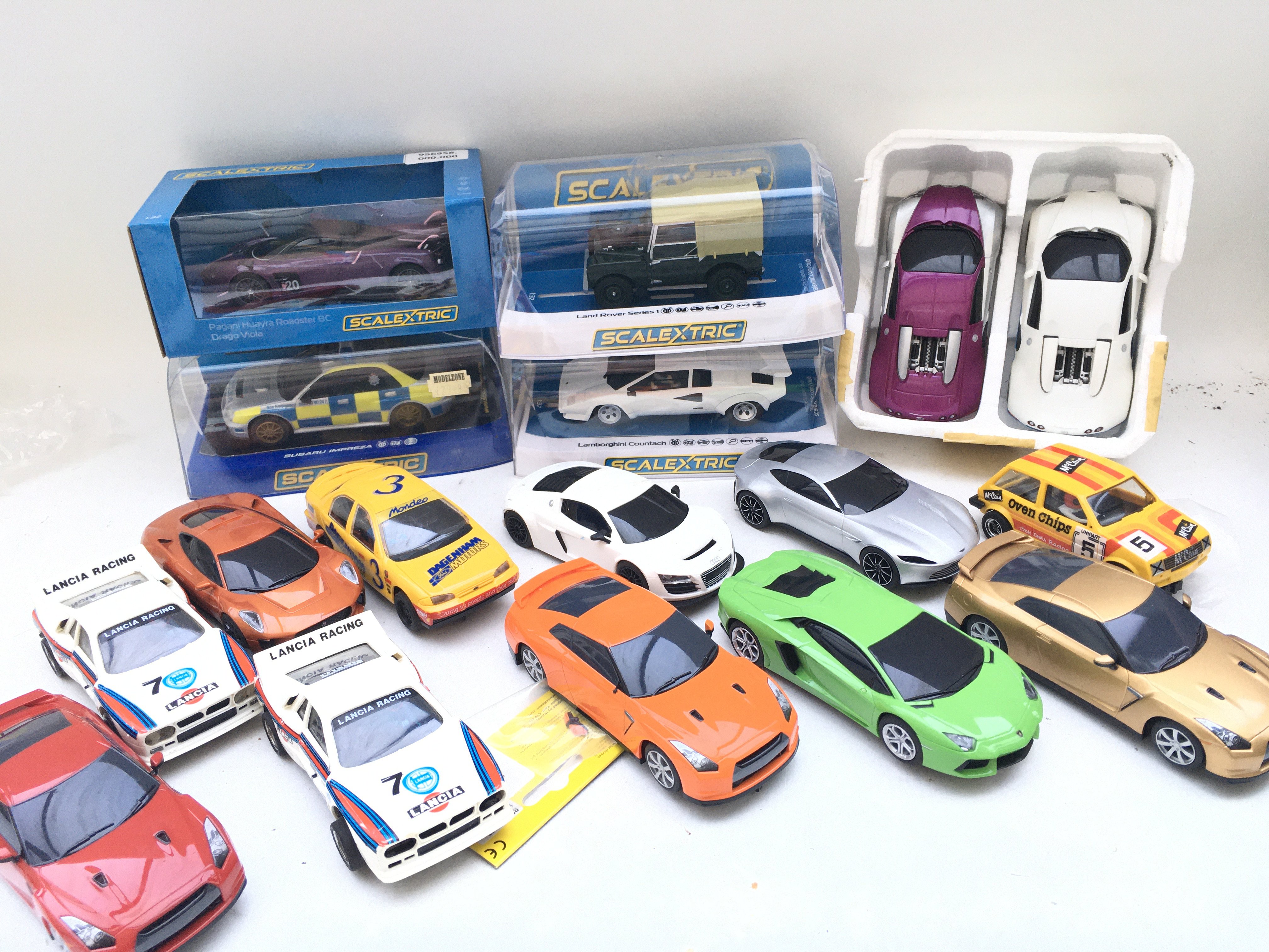 A Collection of Boxed And Loose Scalextric Cars.