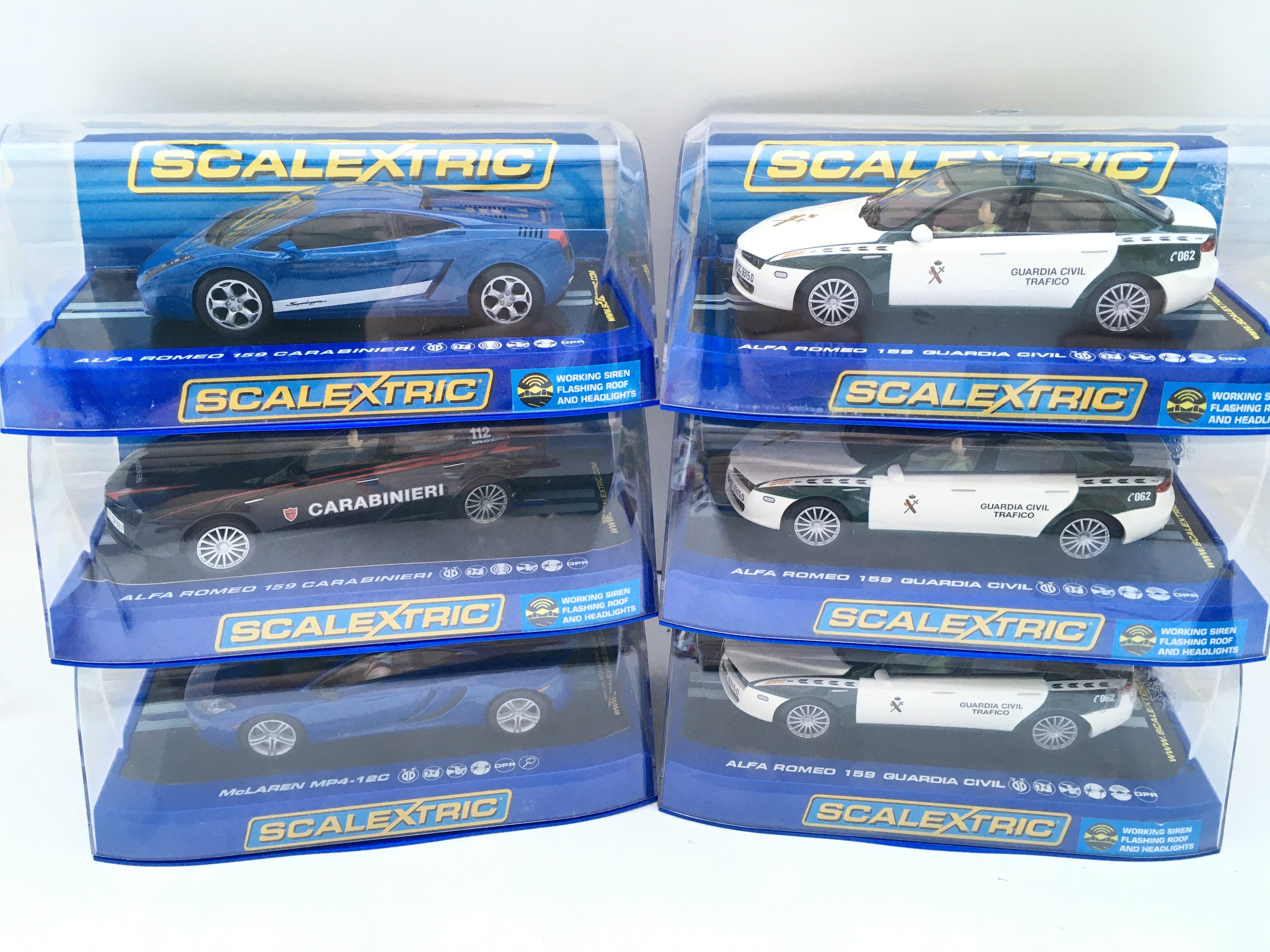 6 X Boxed Scalextric Cars 5 X Alfa Romeo And A McLaren.