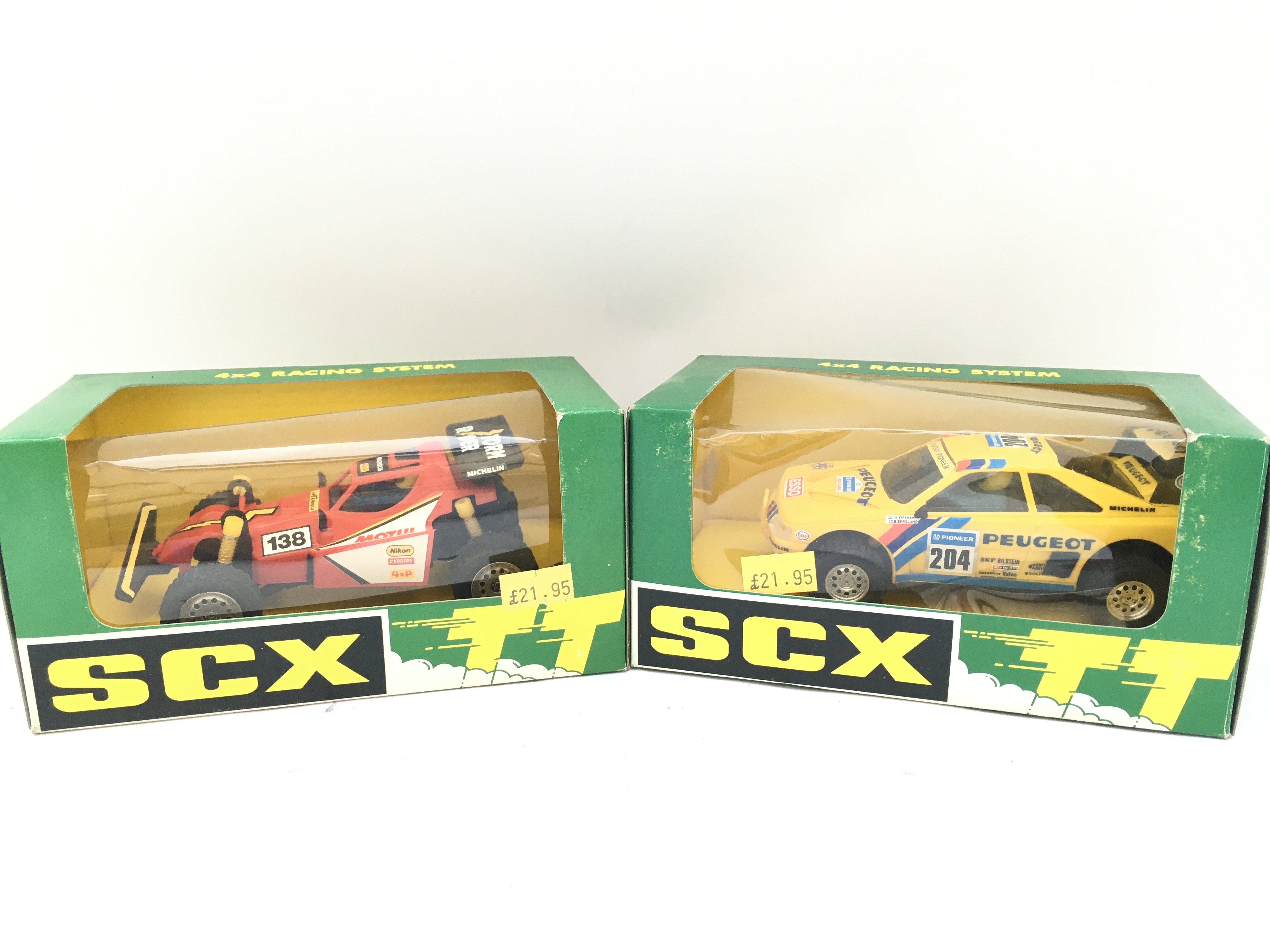 2 X Boxed SCX TT (Scalextric) Vehicles. A Stormrider Buggy And A Peugeot 405 Armardillo.