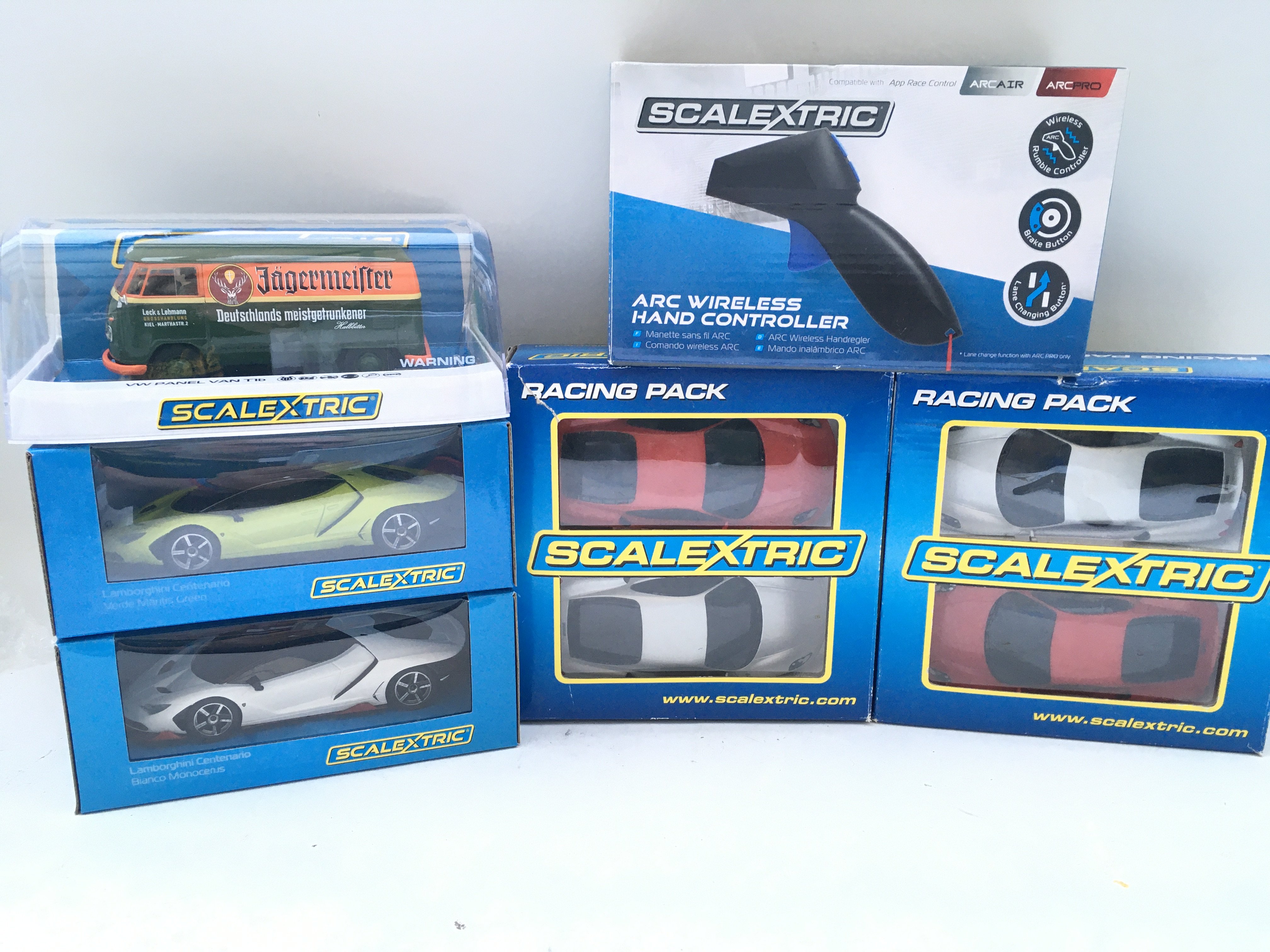 7 Boxed Scalextric Cars And A Boxed Hand Controller.