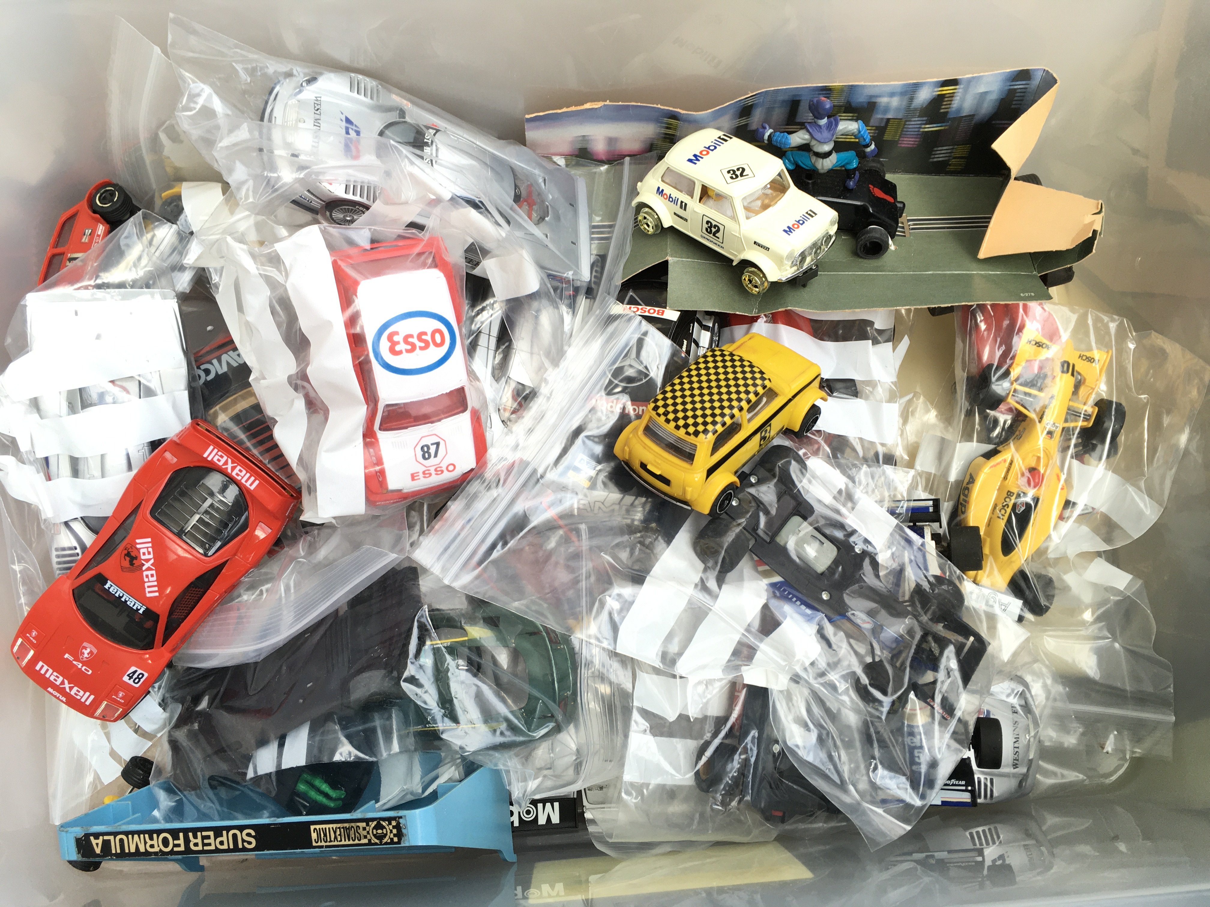 A Box Containing A Collection of Scalextric Cars. Ideal For Spares And Repairs.