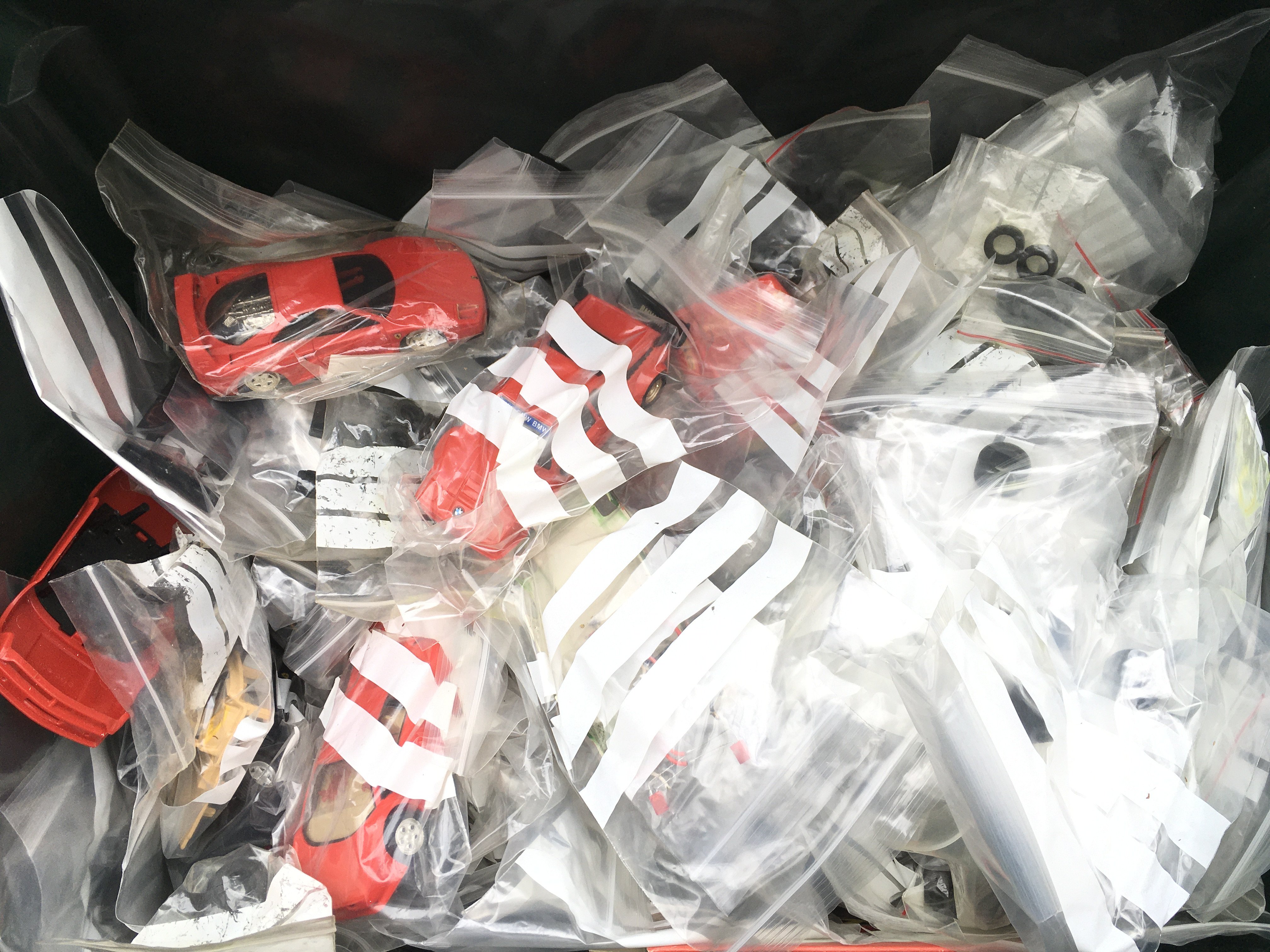 A Box Containing Sclalextric Cars And Spares.