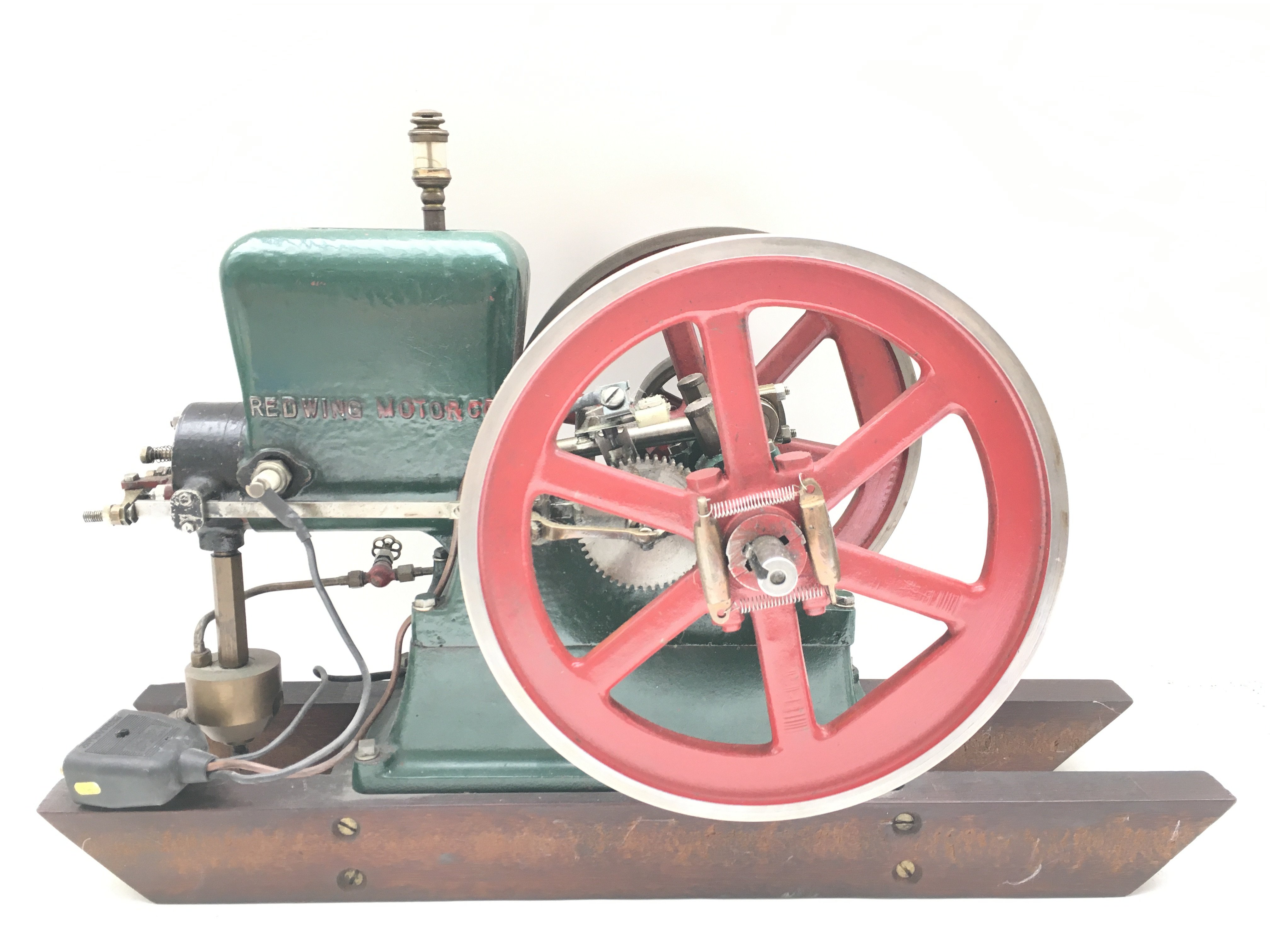 A Red Wing Twin Flywheel Model Patrol/Gasoline Engine. Fitted With Buzz Coil Ignition.