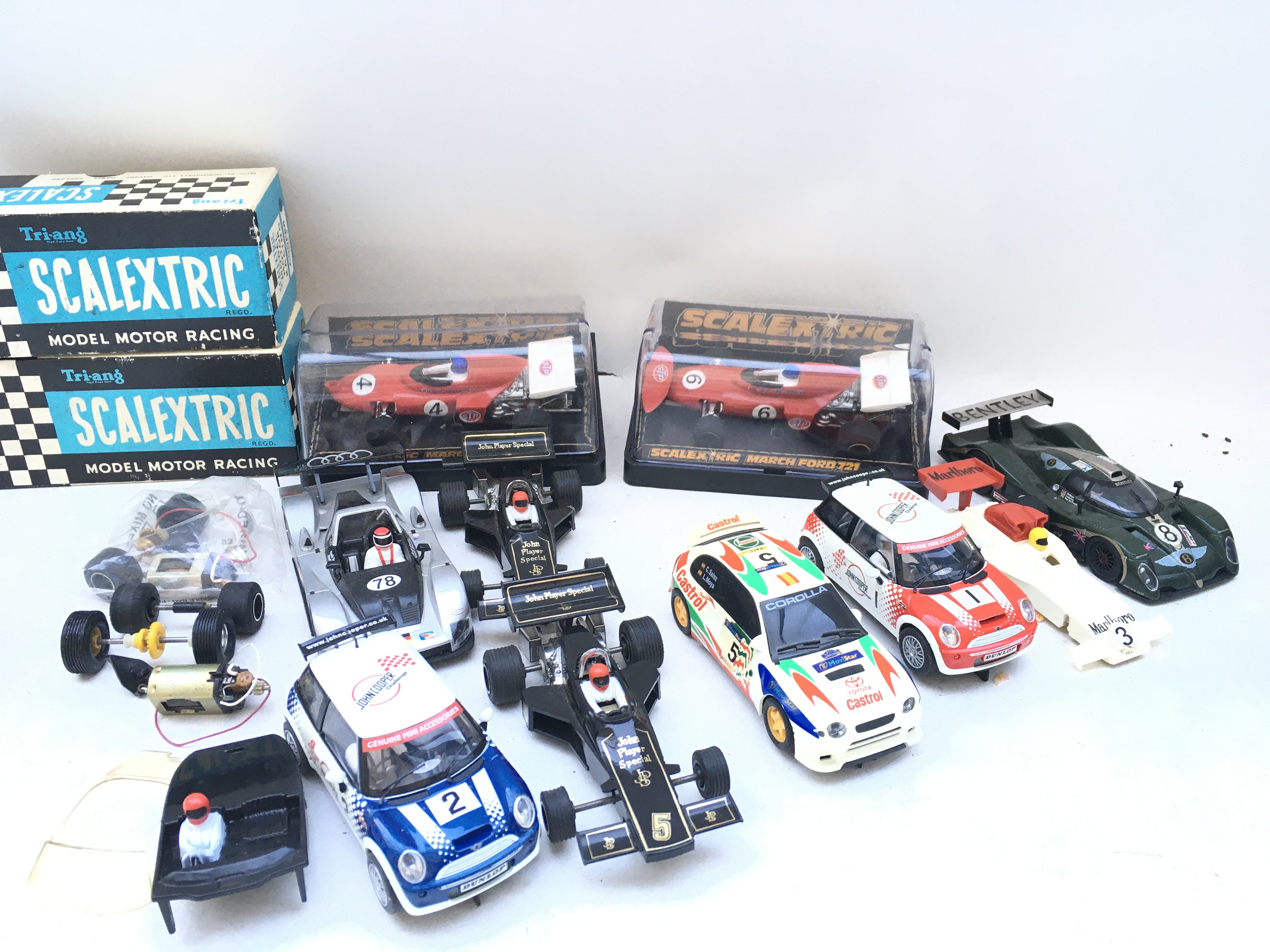 A Collection of Scalextric Cars. Parts And Empty Boxes.