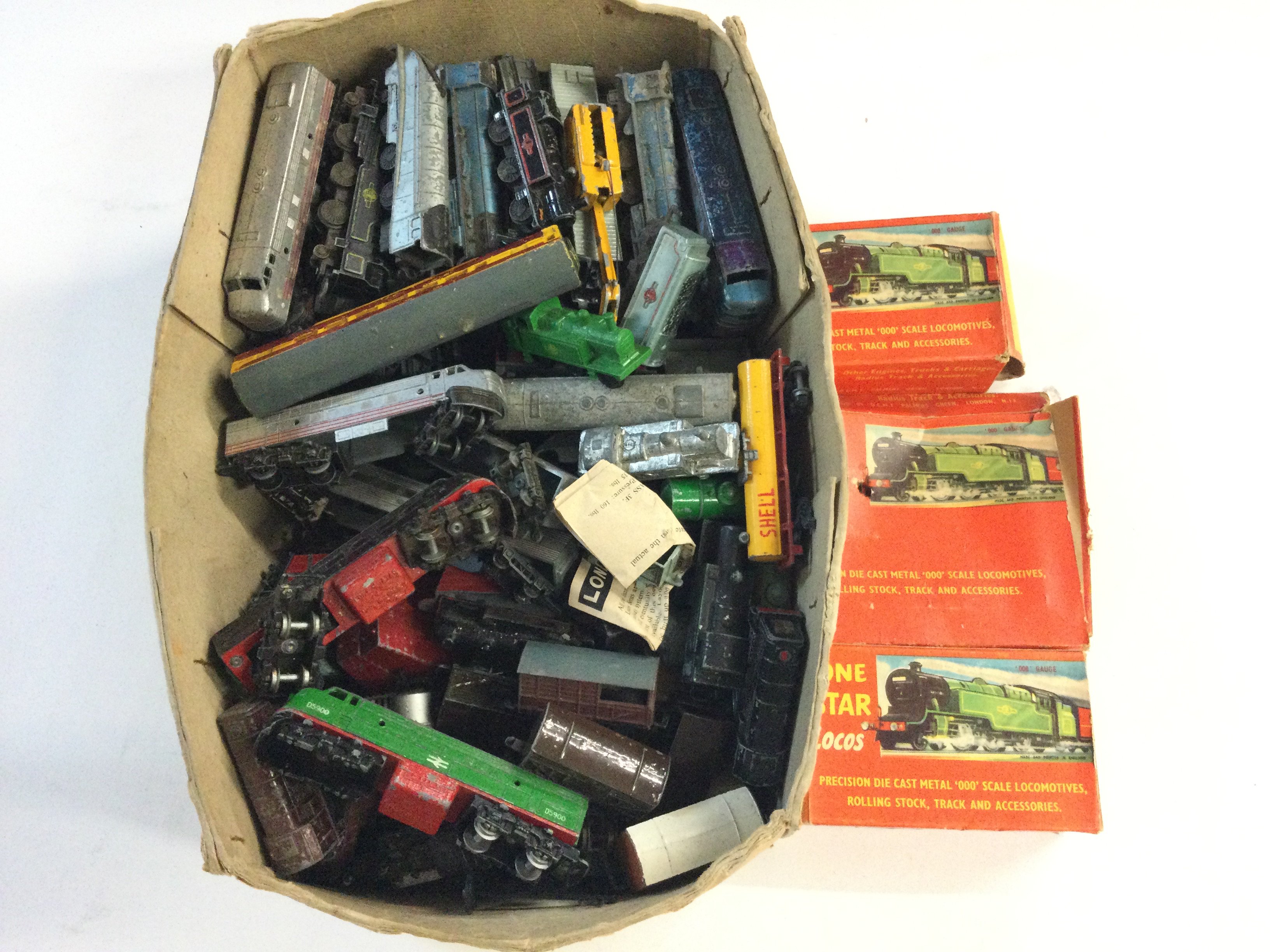 A Box Containing 000 Gauge Diecast Trains. Wagons.Track Etc by Lome Star.