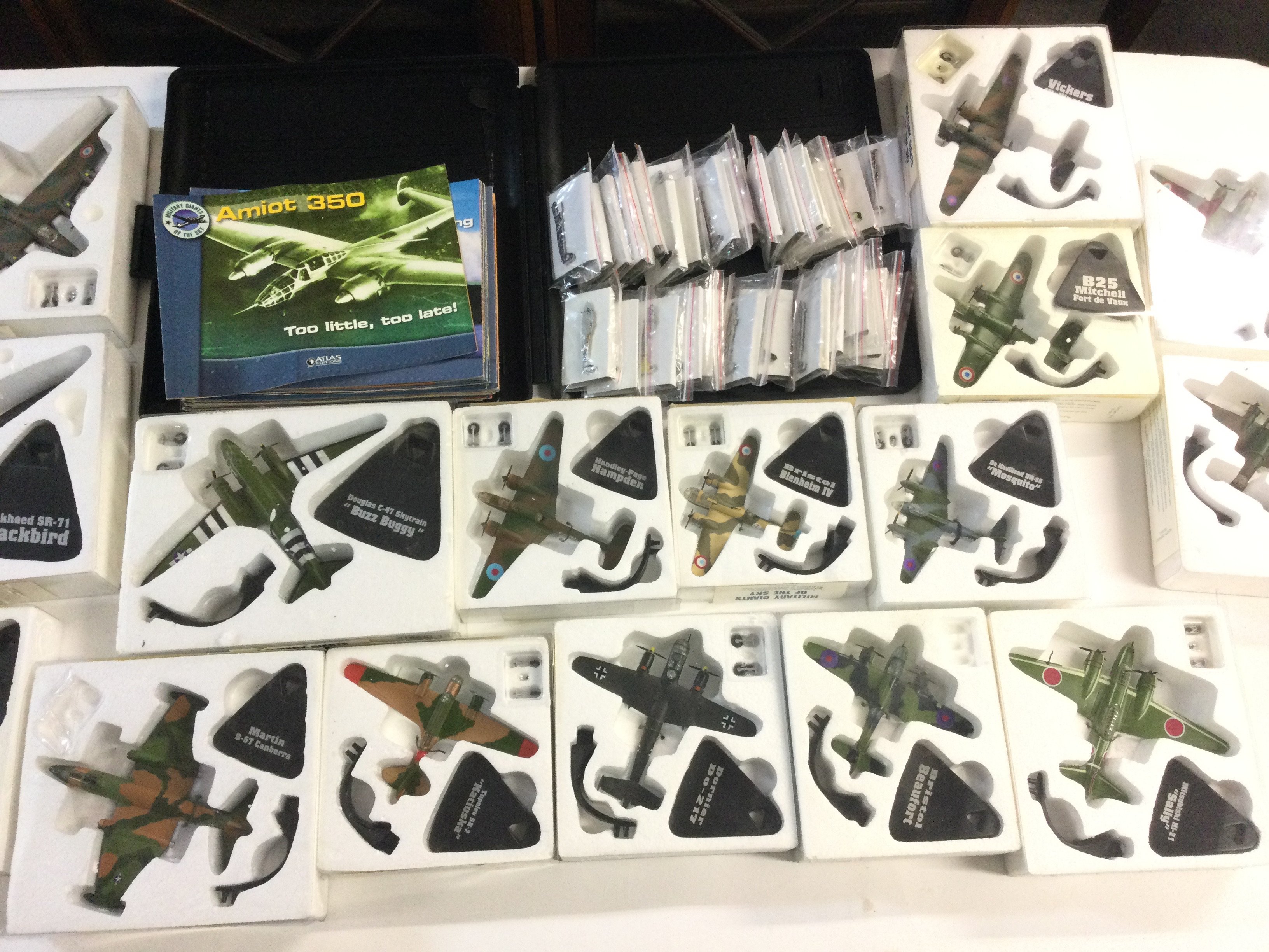 A Box Containing Atlas WW2 Aircraft With Pin Badges And guides. No Reserve.