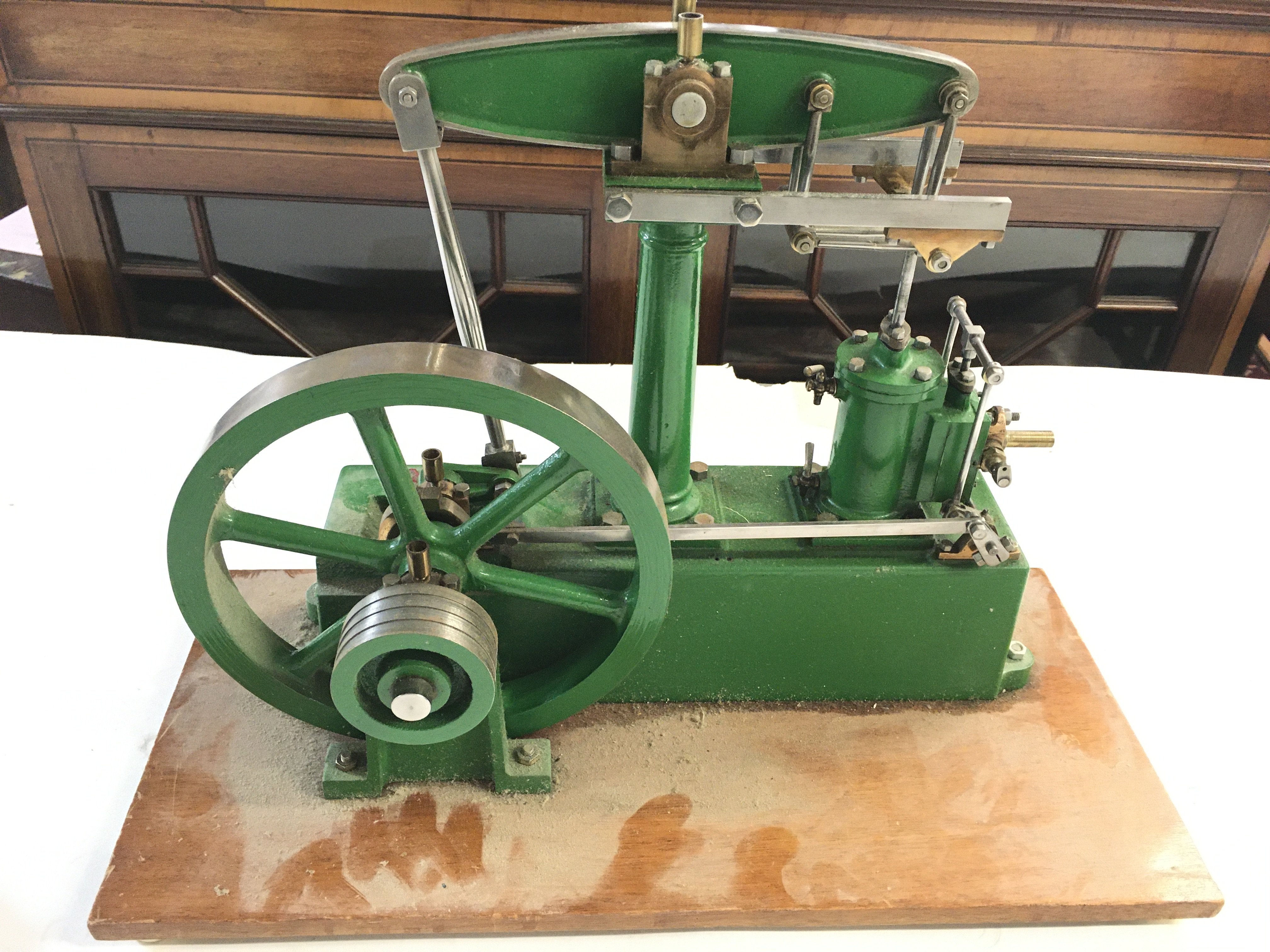 A Stuart Steam Plant With 7 inch Flywheel On A Wooden Plinth.
