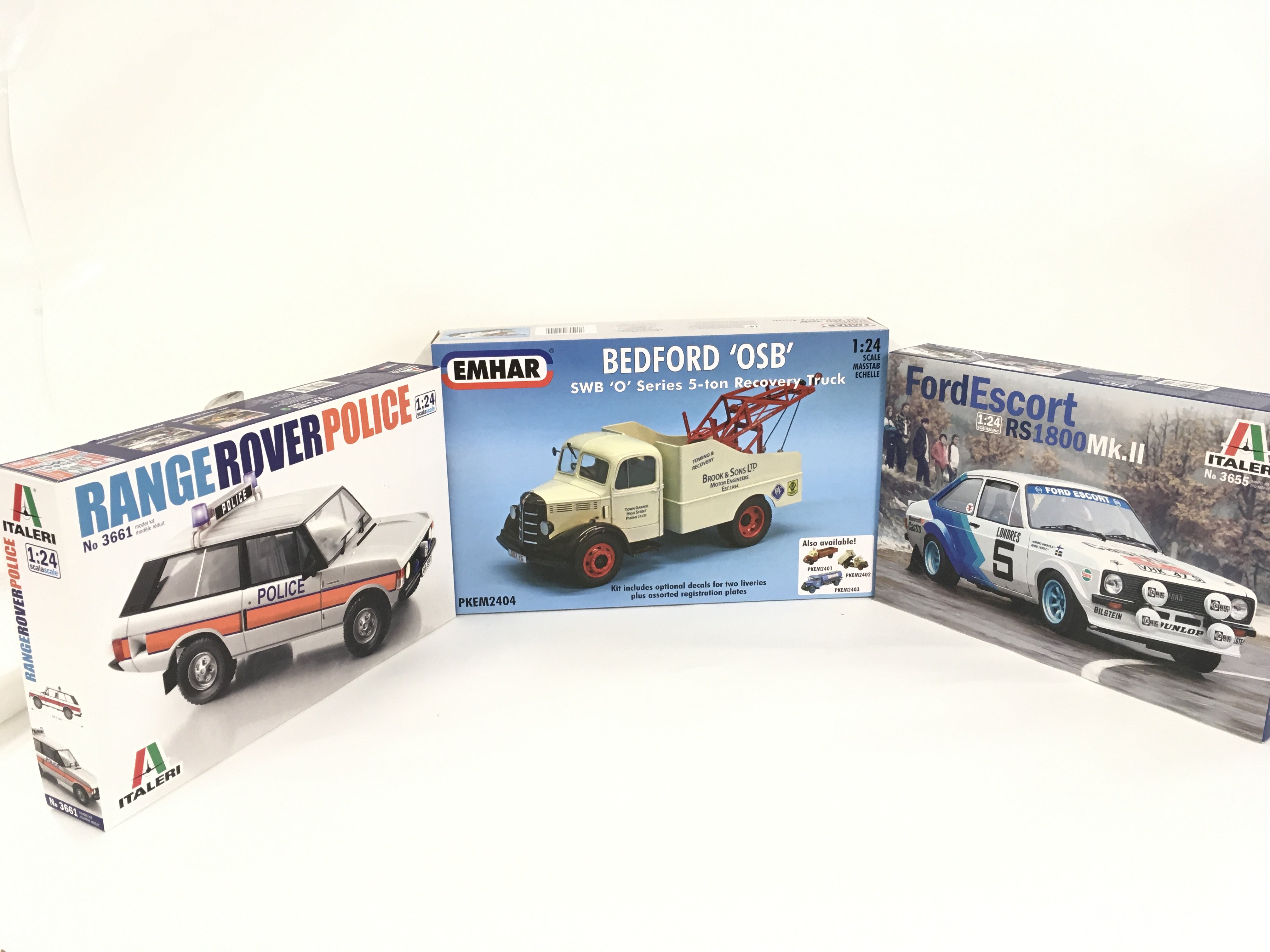 A group of 3 unstarted model kits featuring vehicles includes 2x Italeri No.3661 Range Rover Police and No.3655 Ford Escort RS1800 Mk.11. 1 x Emhar PKEM2404 Bedford OSB. No reserve