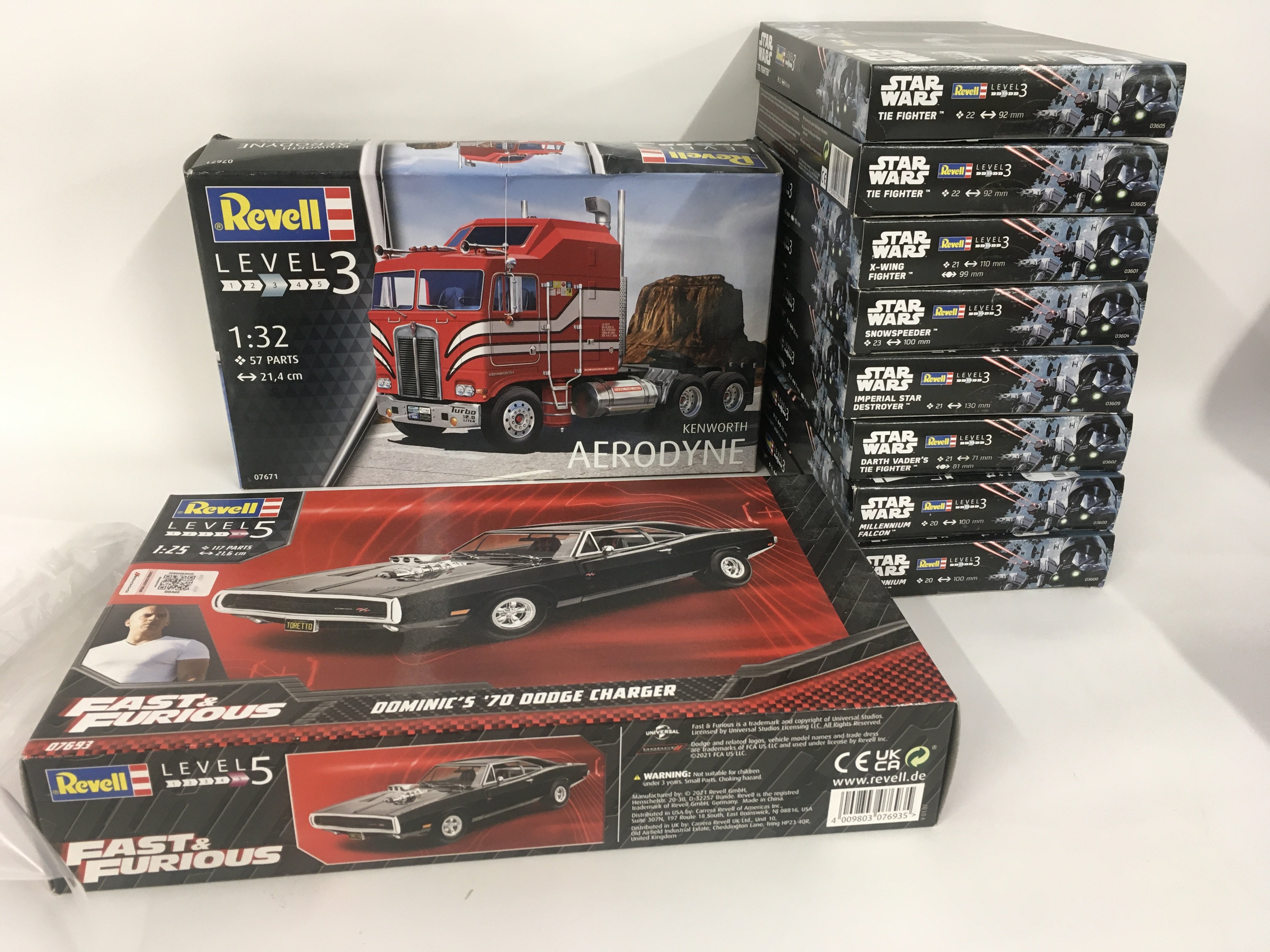 A collection of 10 unstarted model kits by Revell including No.07693 Fast& Furious Dodge charger No.07671 Kenworth Aerodyne and 8x Star Wars vehicles. No reserve