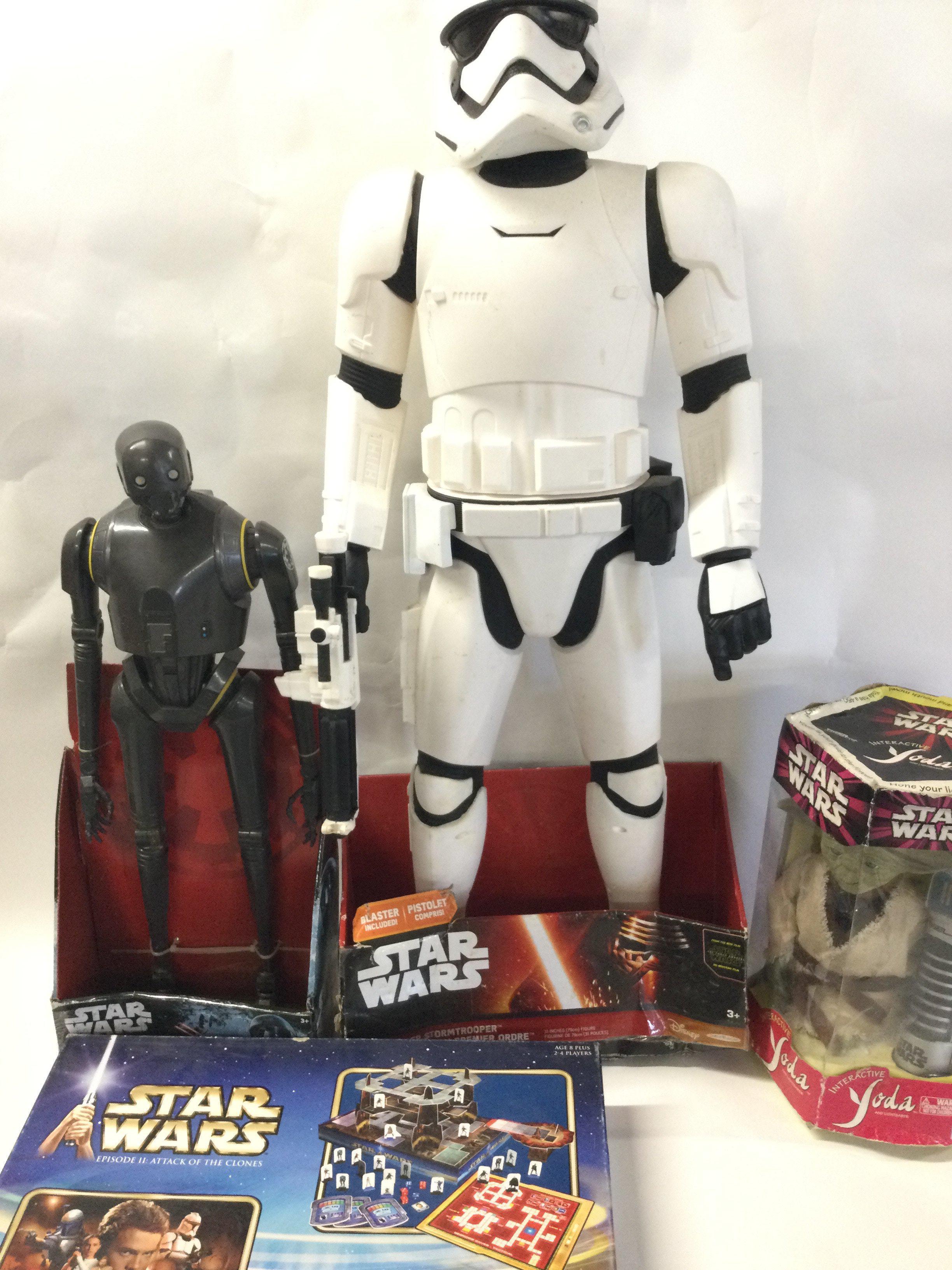 A Small Collection of Various Star Wars Toys Including a Boxed Interactive Yoda. No Reserve.