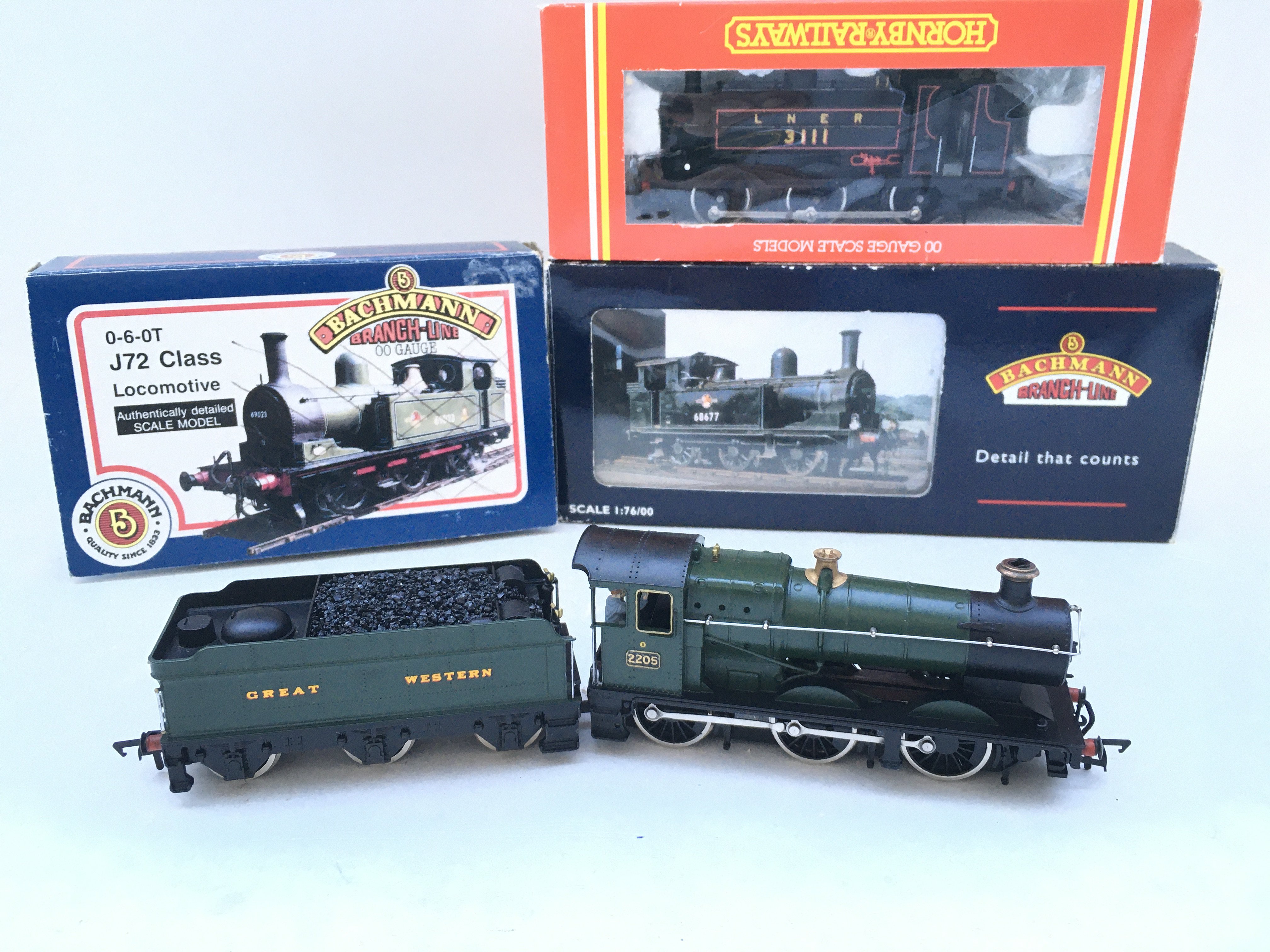 3 Boxed 00 Gauge Locomotives And 1 Loose Includes Bachmann. Hornby And Mainline. No Reserve.