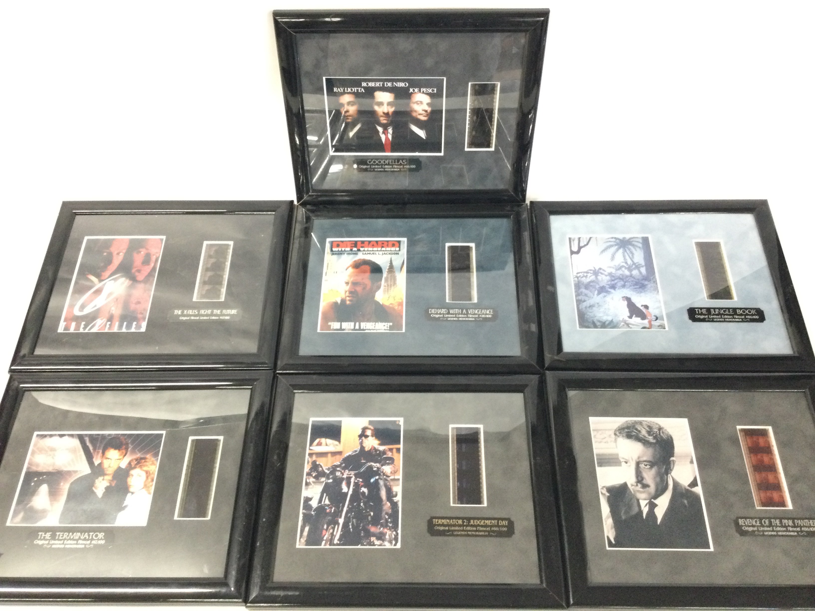 A Collection of Various Framed Movie Film Cells Including Terminator. Diehard With Vengence. Goodfellas. The Jungle Book Etc.