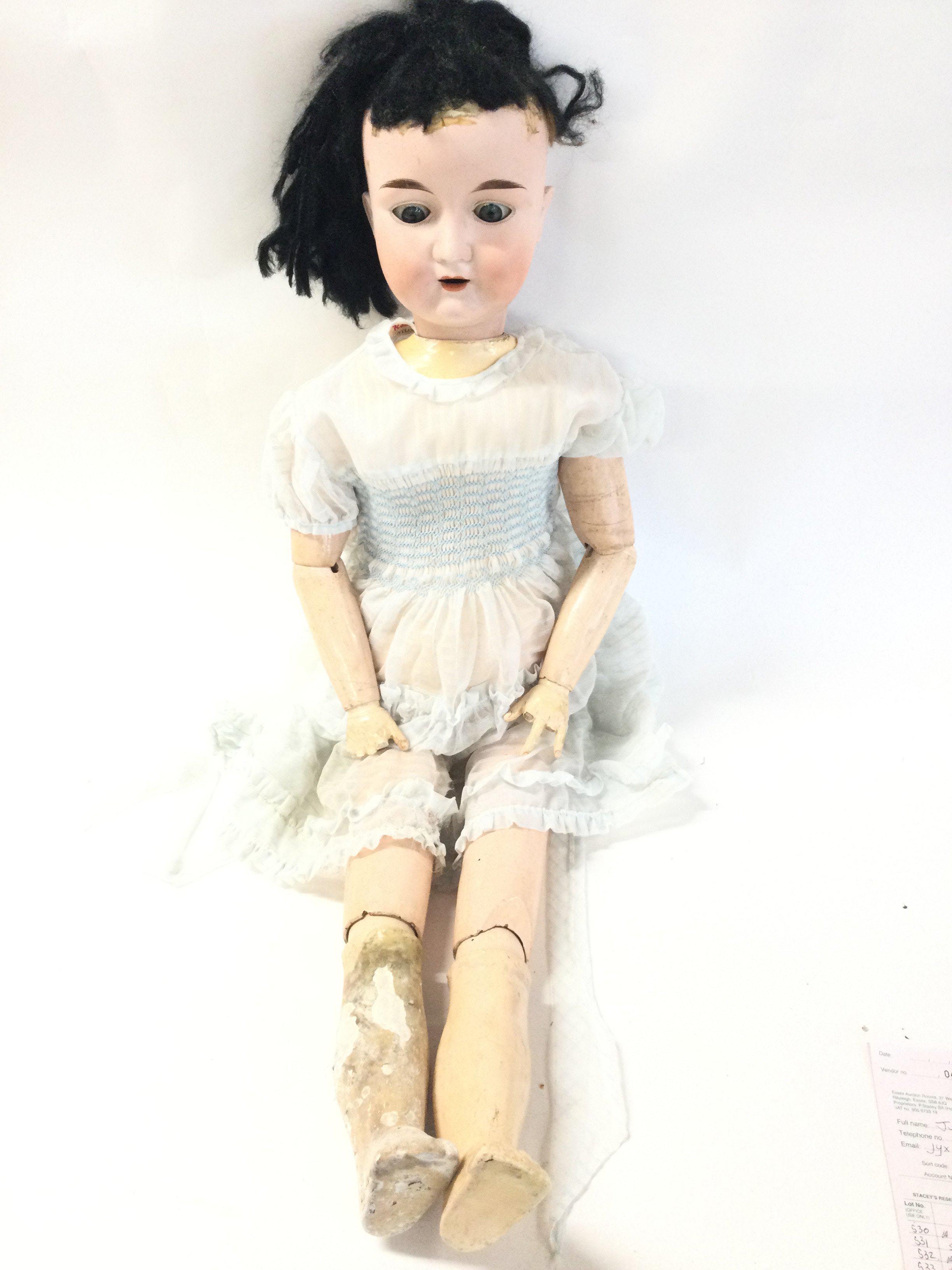 A Cannetto Furga Doll. With Some Damage. Approx Length 94CM.