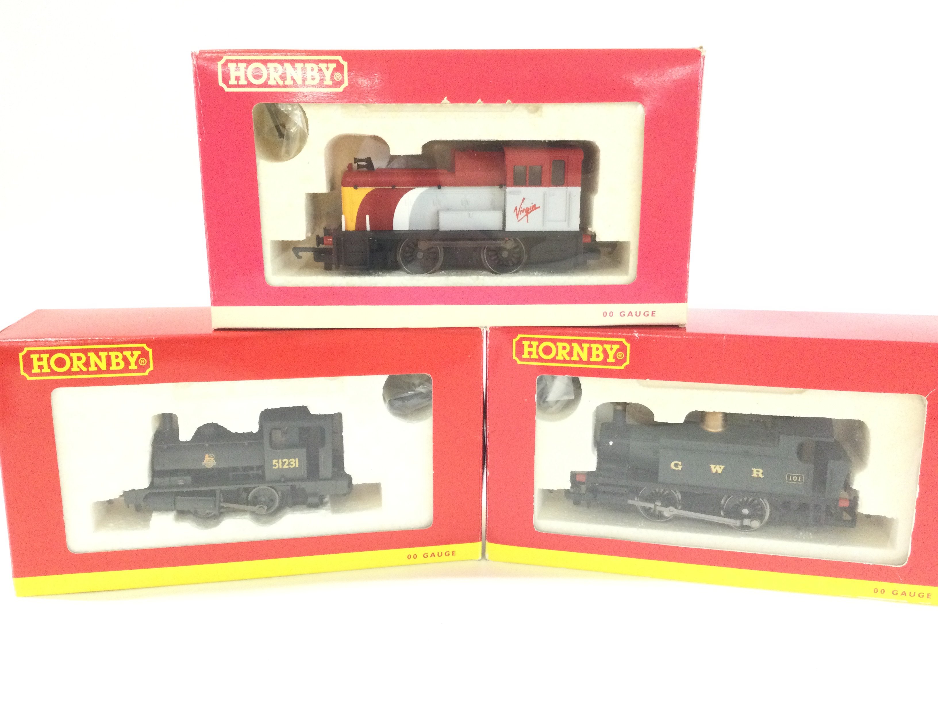 3 X Boxed 00 Gauge Locomotives. A Virgin 0-4-0 Diesel #R 2375. A BR 0-4-0st PUG #R2335 And A Industrial Locomotive #R2304.