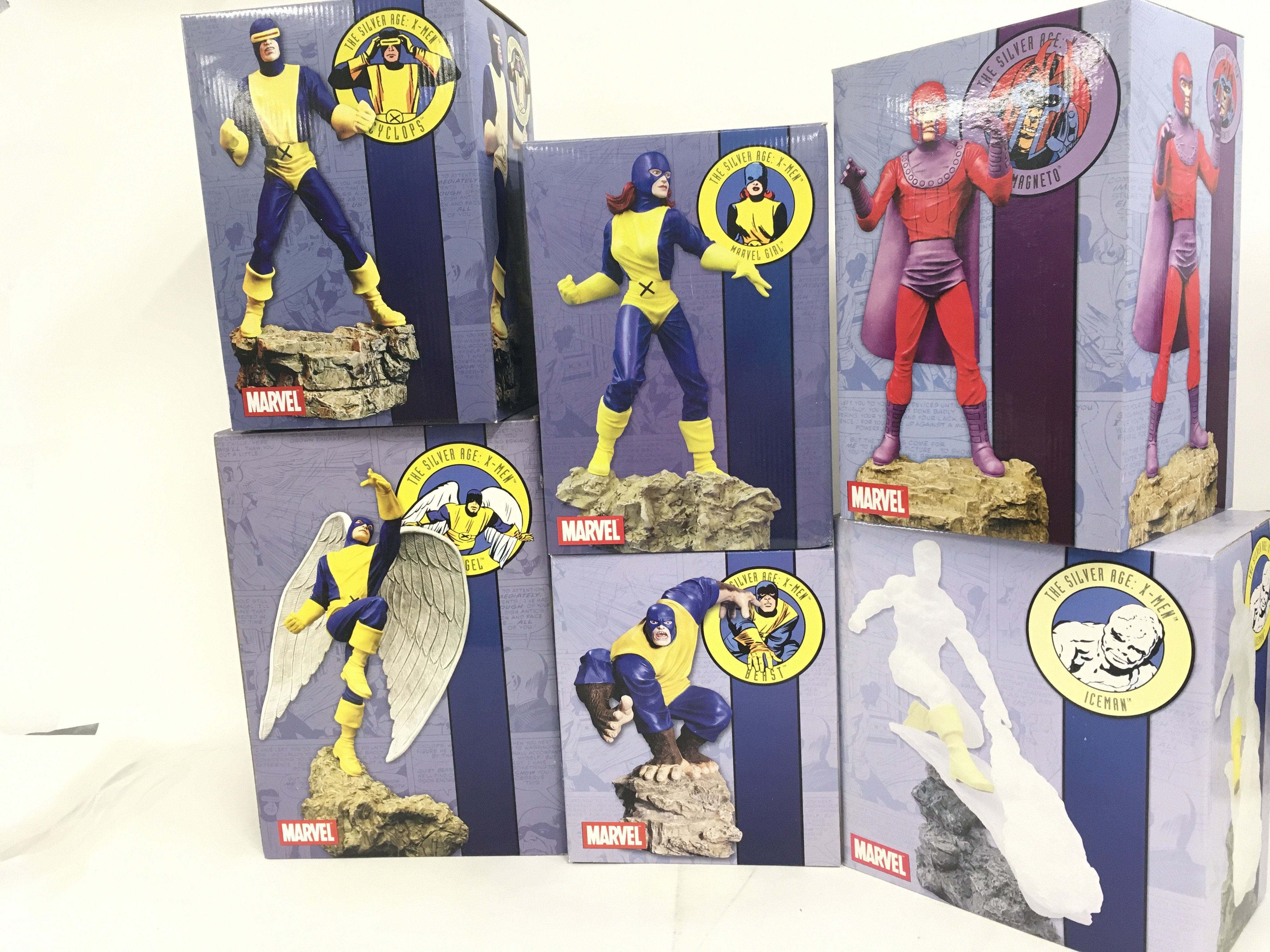 A Collection of six boxed Marvel statues produced to form a diorama showing the original 5 Silver Age XMen facing off against Magneto. No Reserve