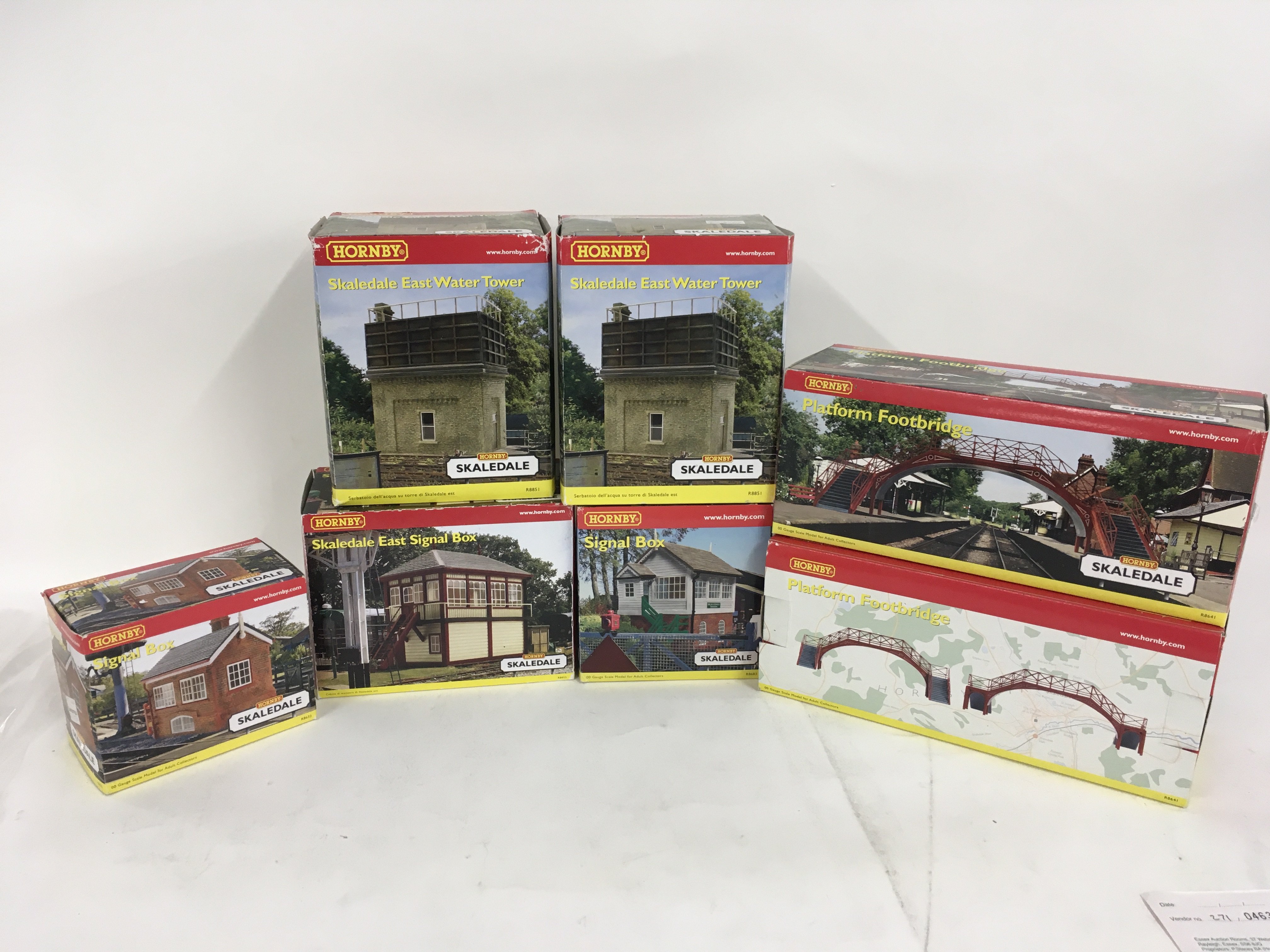 A collection of 7 boxed OO scale railway buildings by Hornby. No reserve
