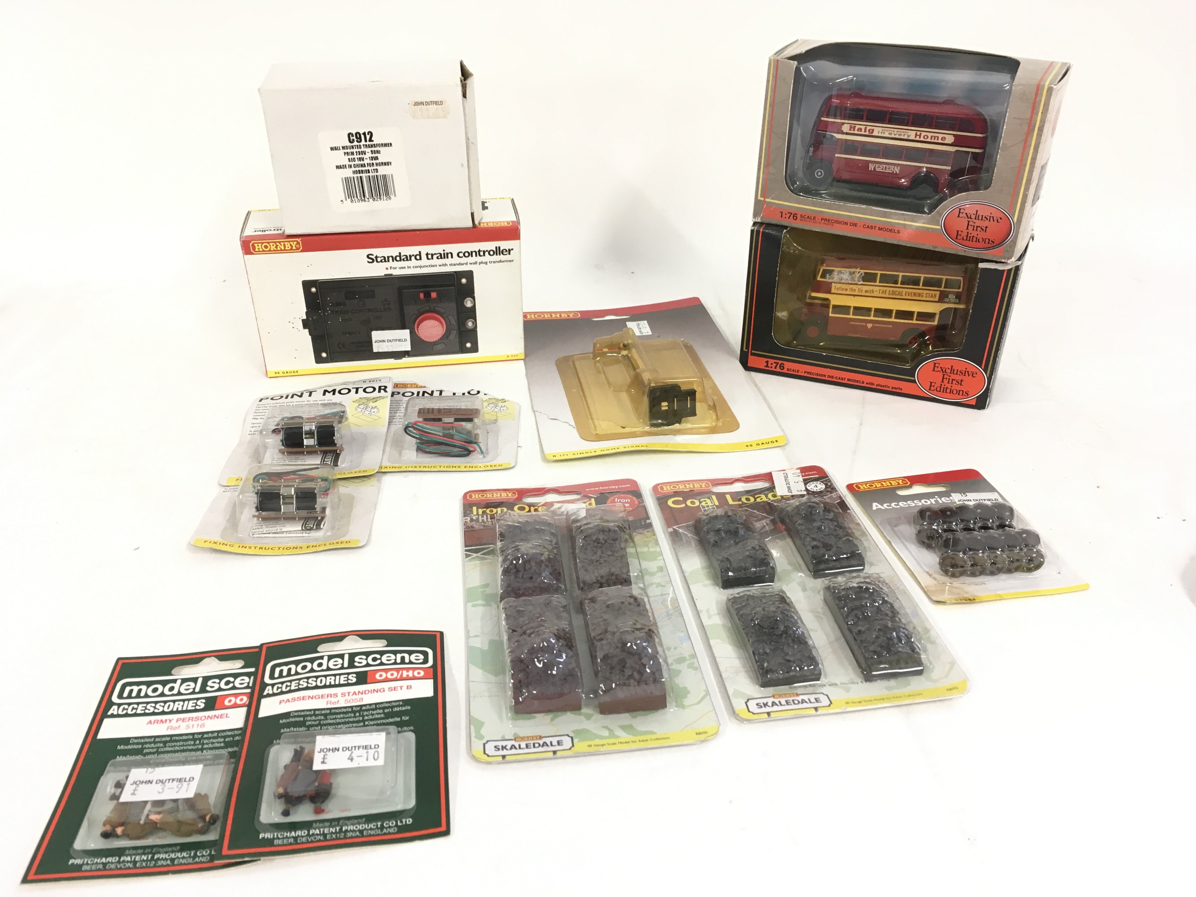 A Collection of boxed model railway accessories by Hornby and Model Scene also includes 2 EFE boxed buses. No reserve