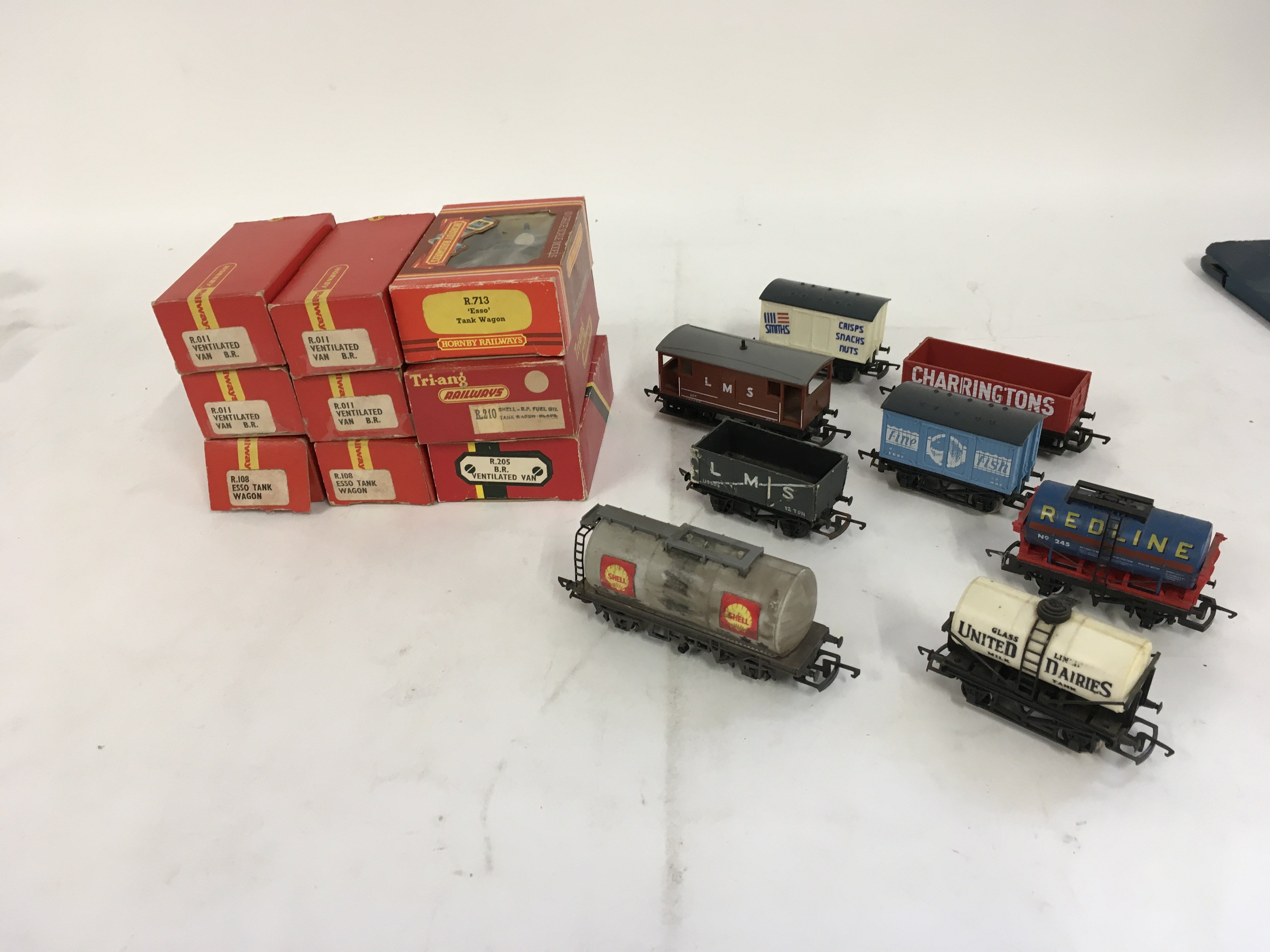 A collection of 9x boxed wagons by Hornby and Triang. Includes 8 loose wagons all 00 gauge No reserve.