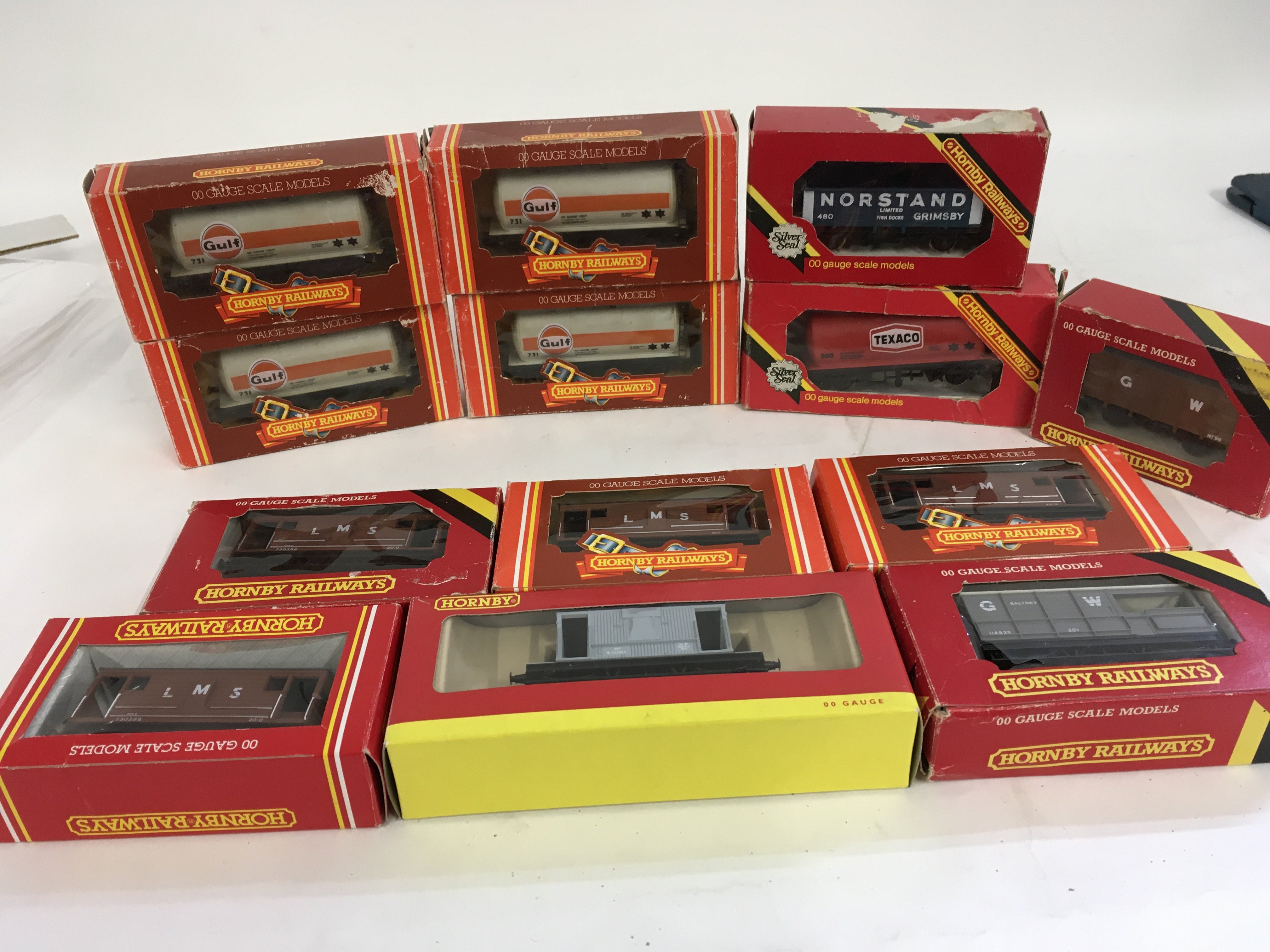 A collection of 13x boxed 00 gauge wagons by Hornby. No reserve