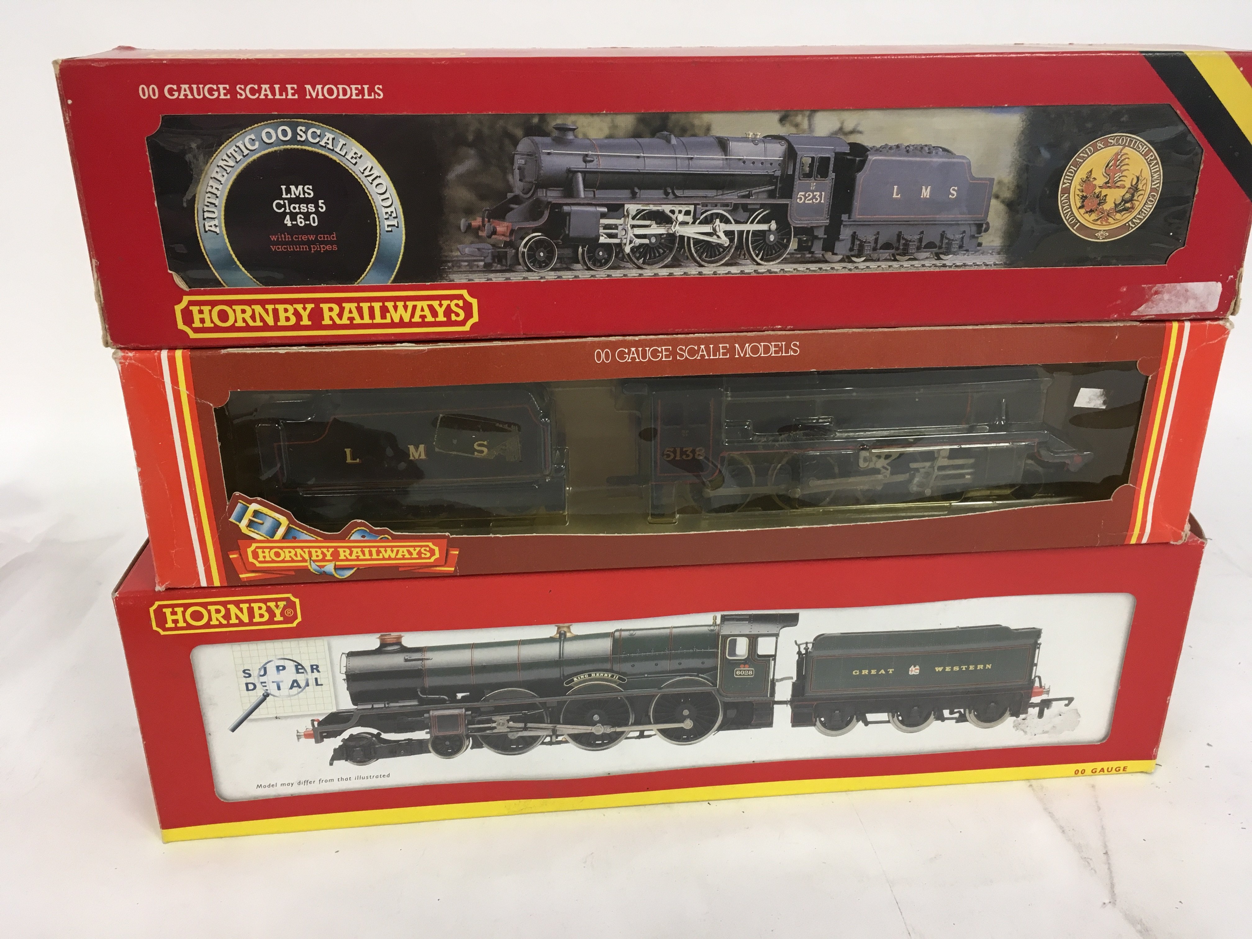 A group of 3 boxed Hornby model locomotives 00 gauge. Features R840 Black Five &hellip;.R858 class 5 Loco..R2390 King Henry. No reserve