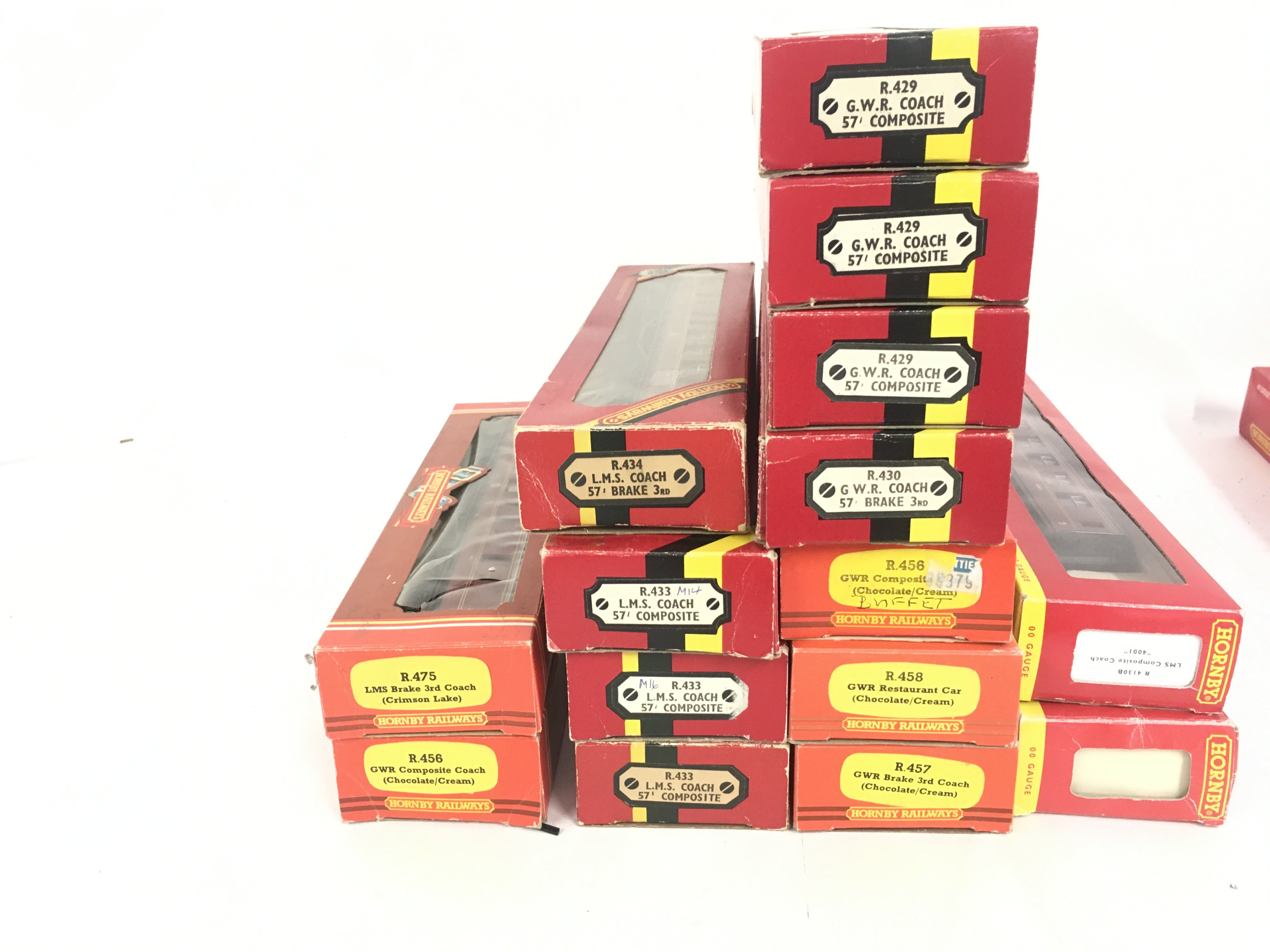 A collection of 15 boxed model railway coaches by Hornby 00 gauge. No reserve.