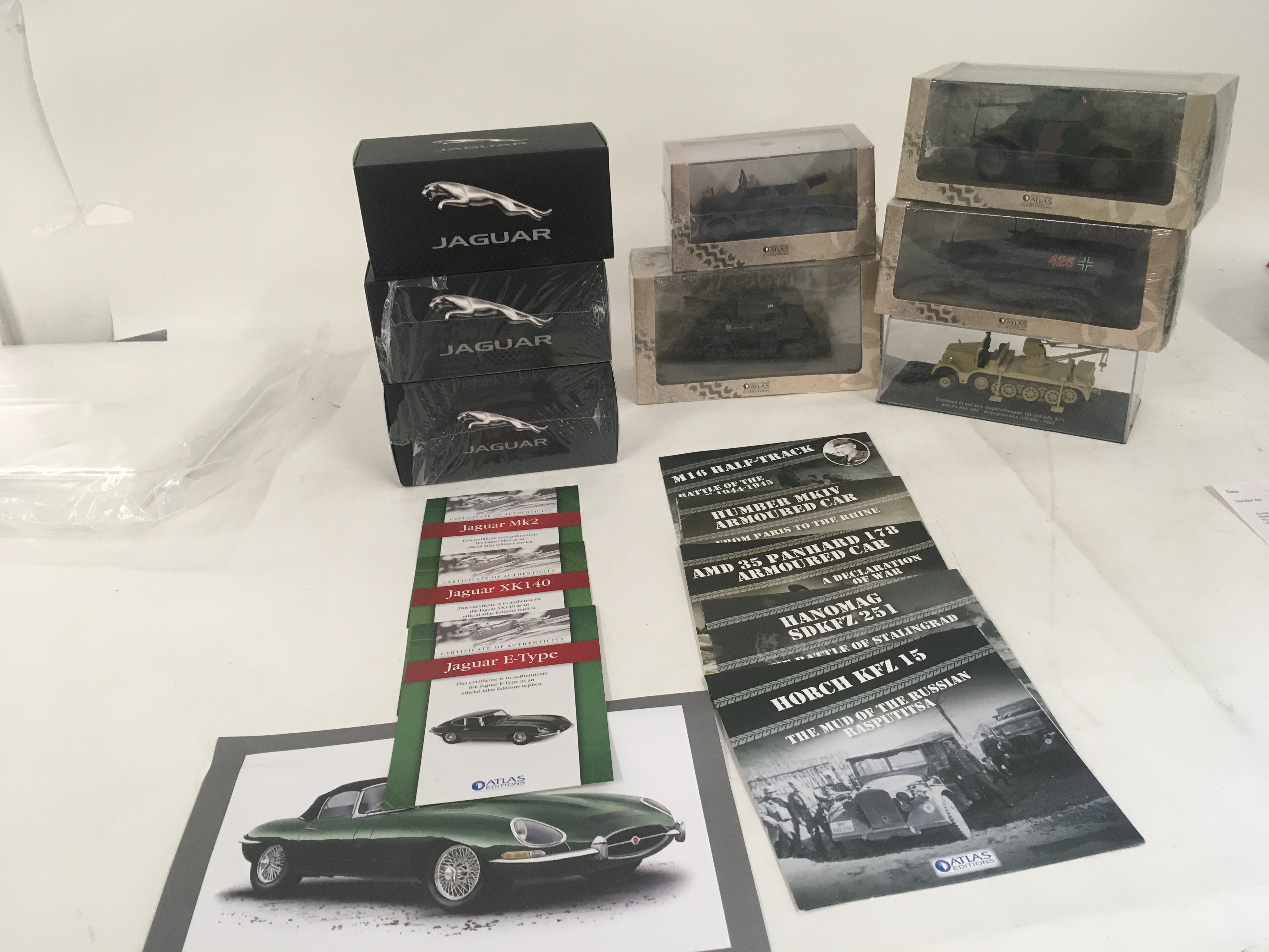 A collection of8 boxed Atlas model vehicles..namely Jaguar and military. No reserve.