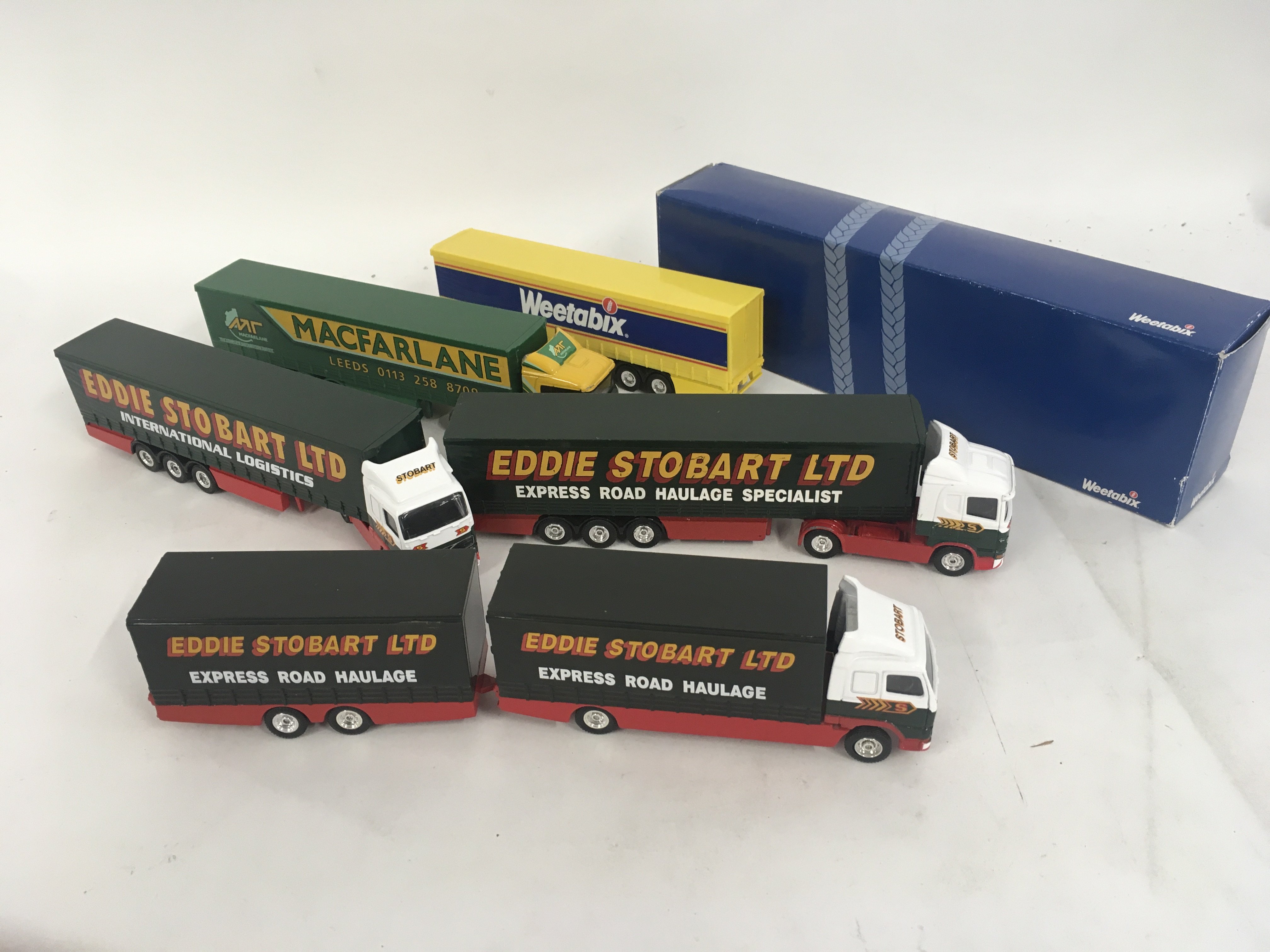 A collection of 5 Corgi commercial unit with trailer. Includes some Stobart. No reserve