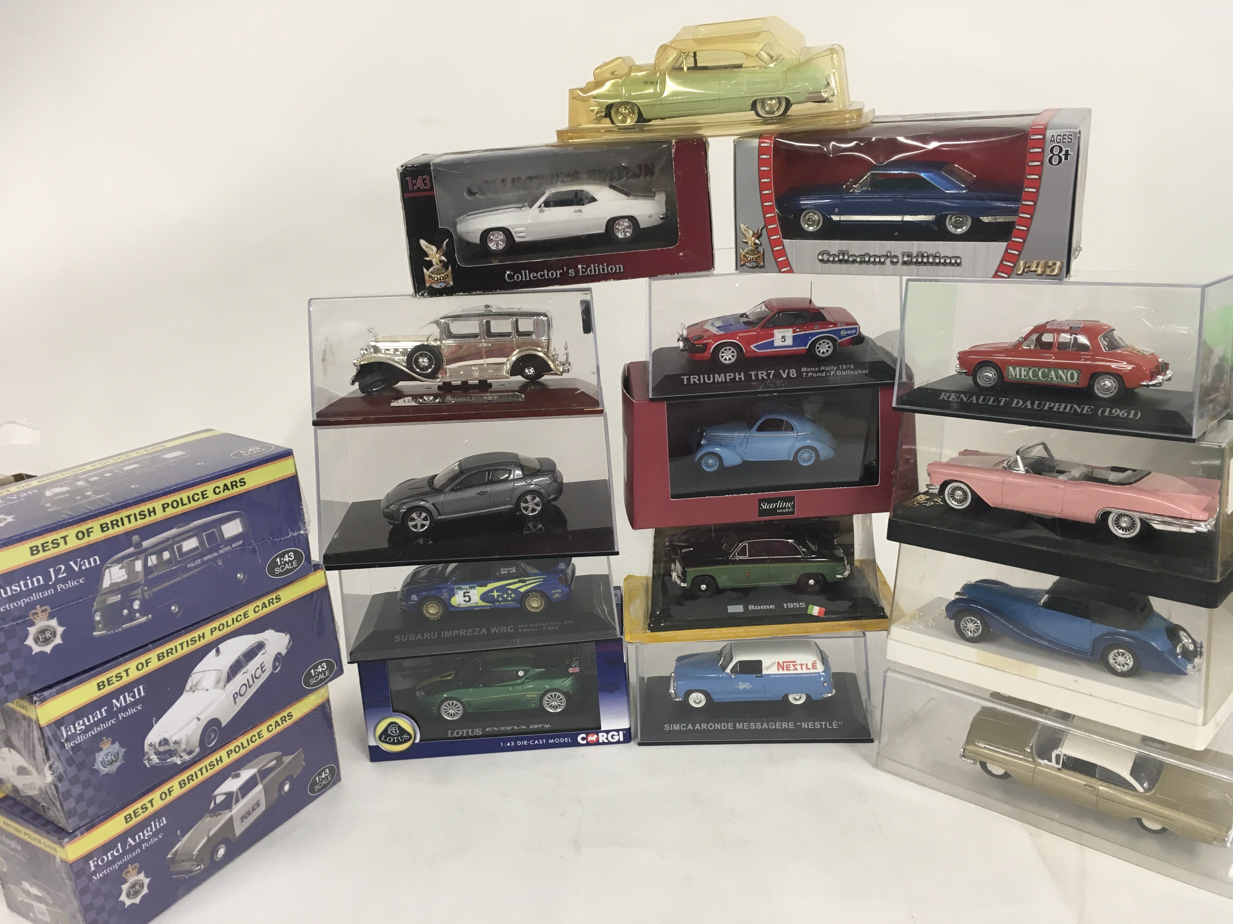 A collection of 18 boxed diecast model cars by Atlas..Solido etc. no reserve