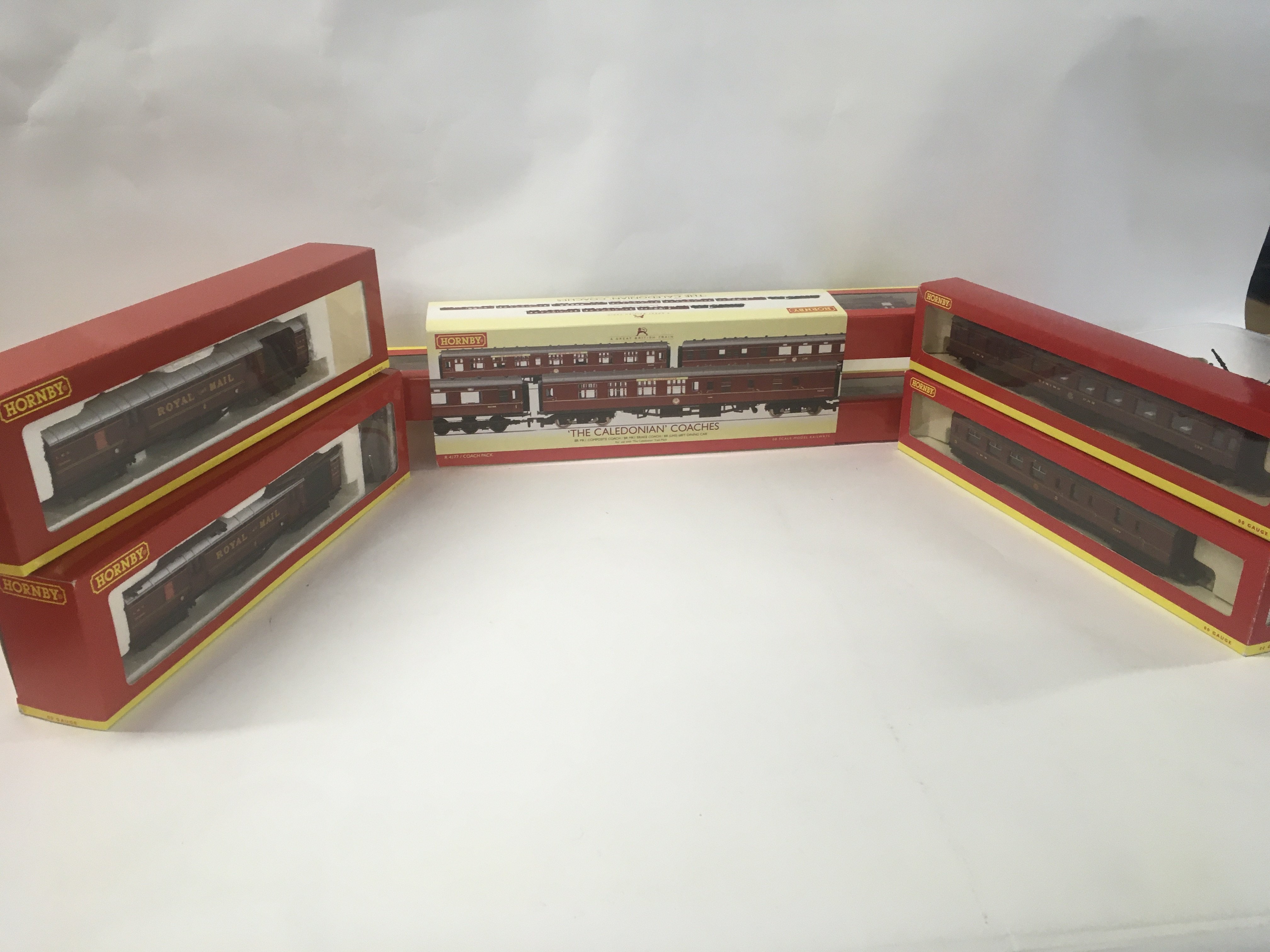A collection of boxed Hornby model railway coaches comprising R4155..R4095B..R4129A. R4177. No reserve