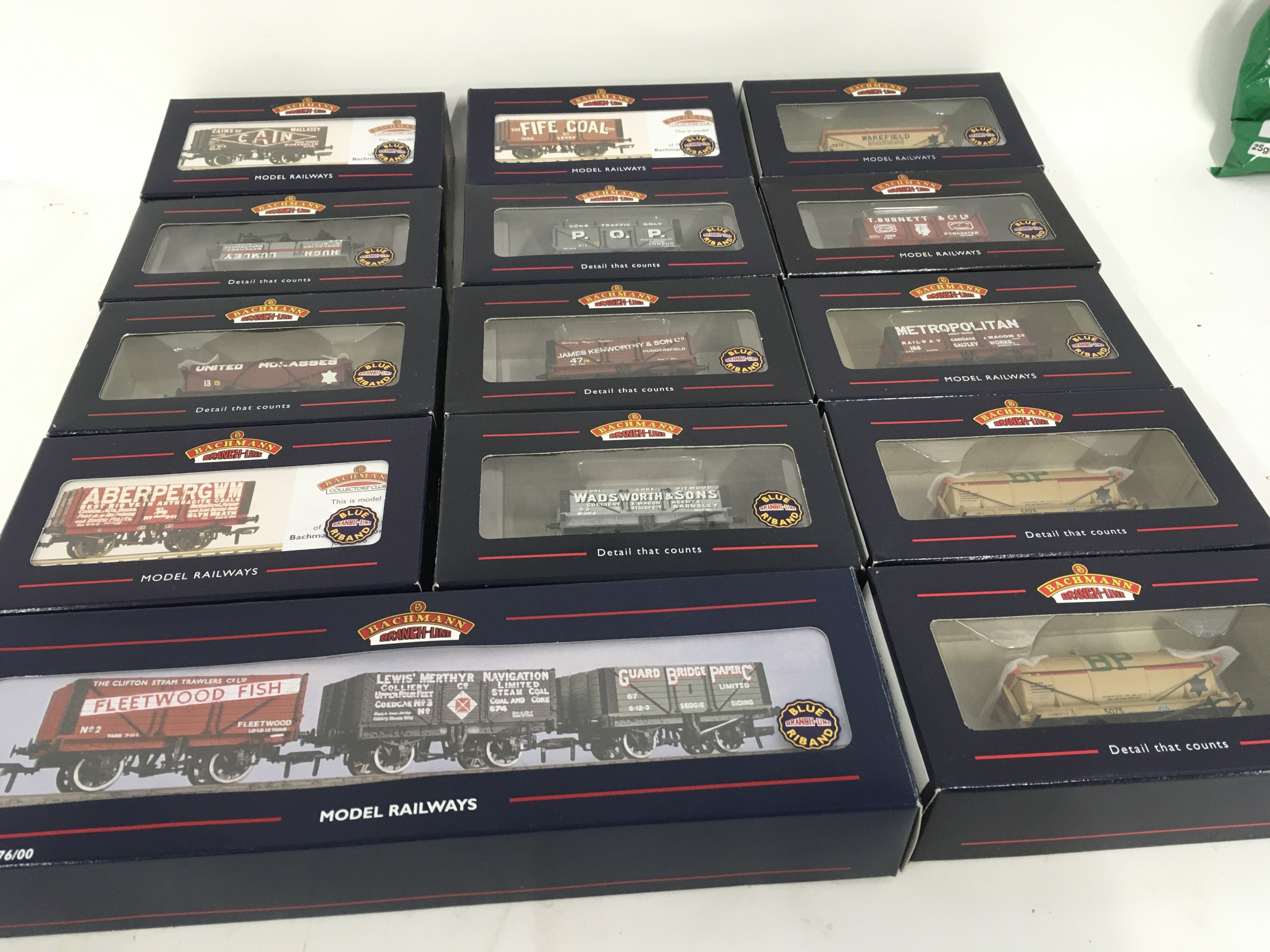 A collection of 14 boxed 00 gauge model railway wagons by Bachmann. No reserve.