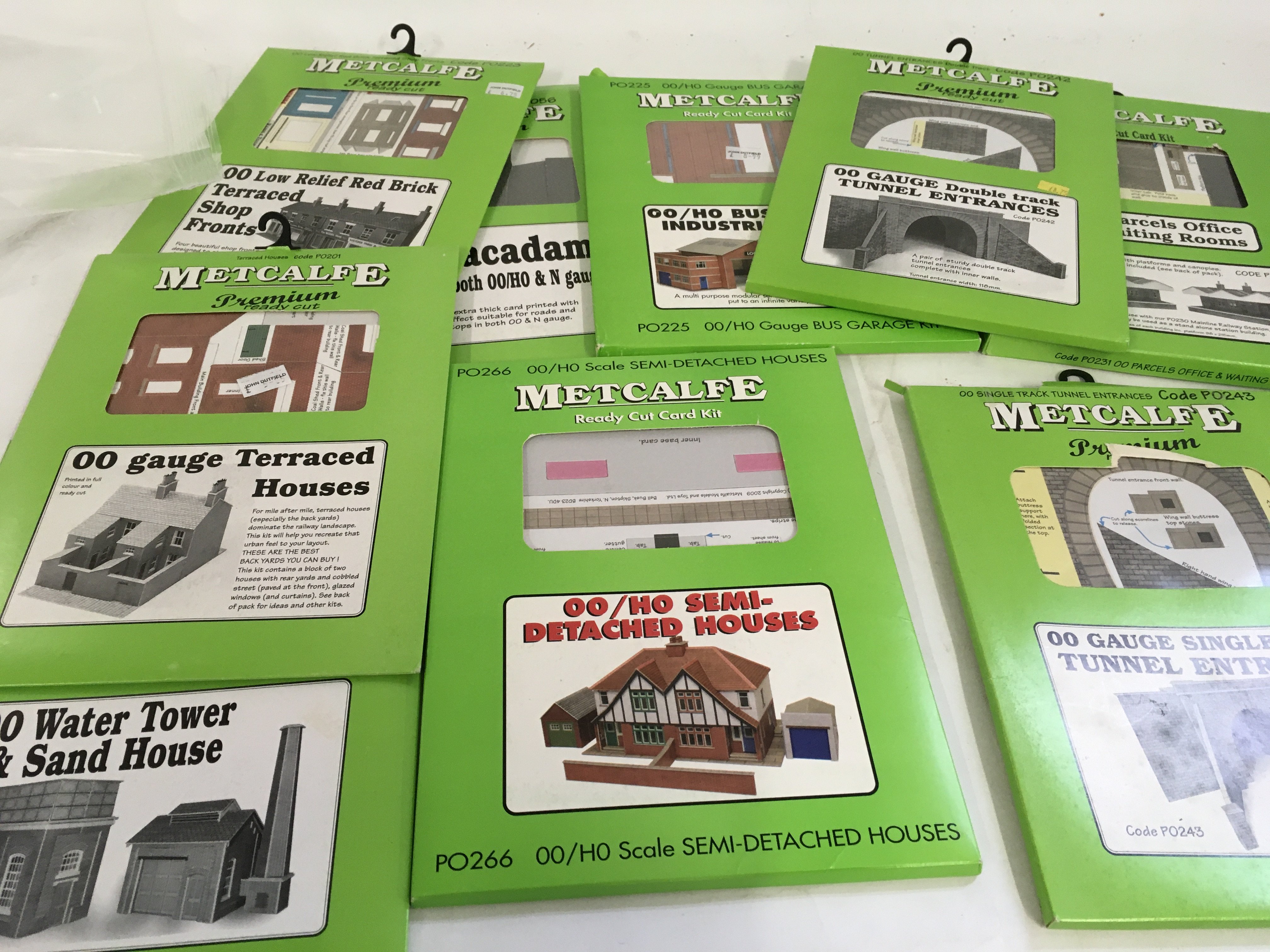 A collection in excess of 30 packs of Metcalfe printed Ready cut Card kits for creating scenery. Some have been opened but many remain sealed. 00 gauge. No reserve