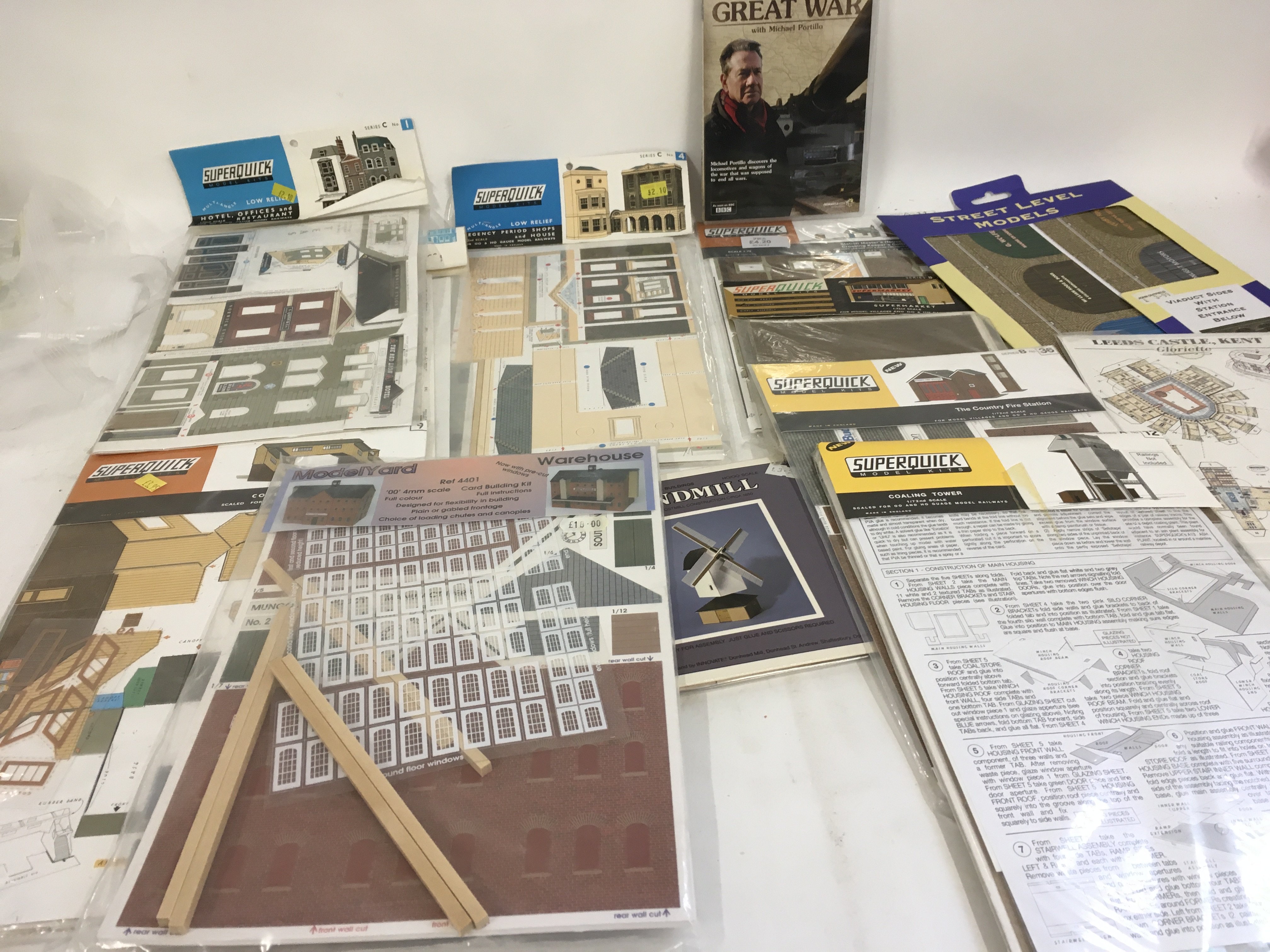 A collection of card model kits 00 HO scale by Superquick and others. Includes Dvd. No reserve